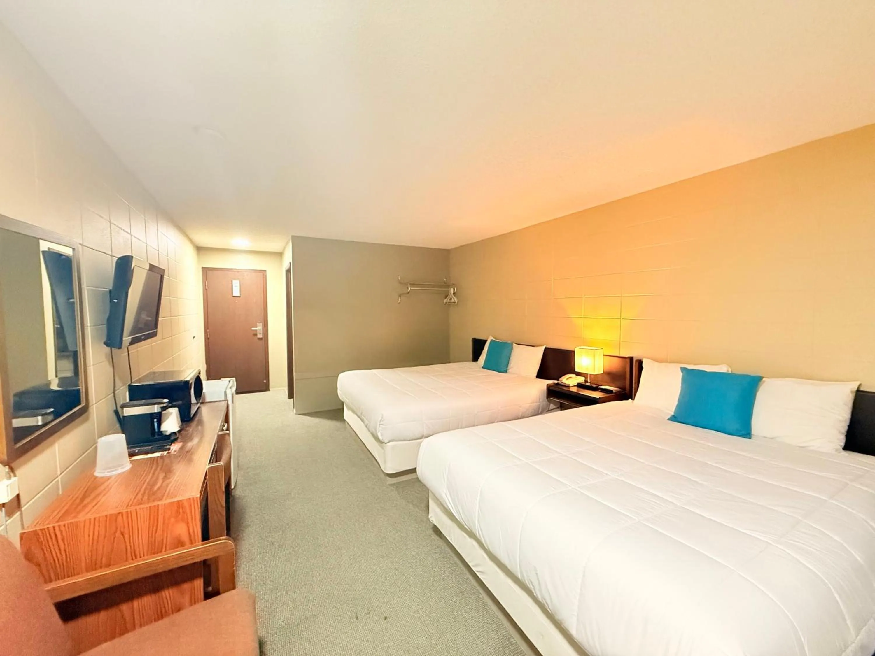 Bed in Capri Motor Inn