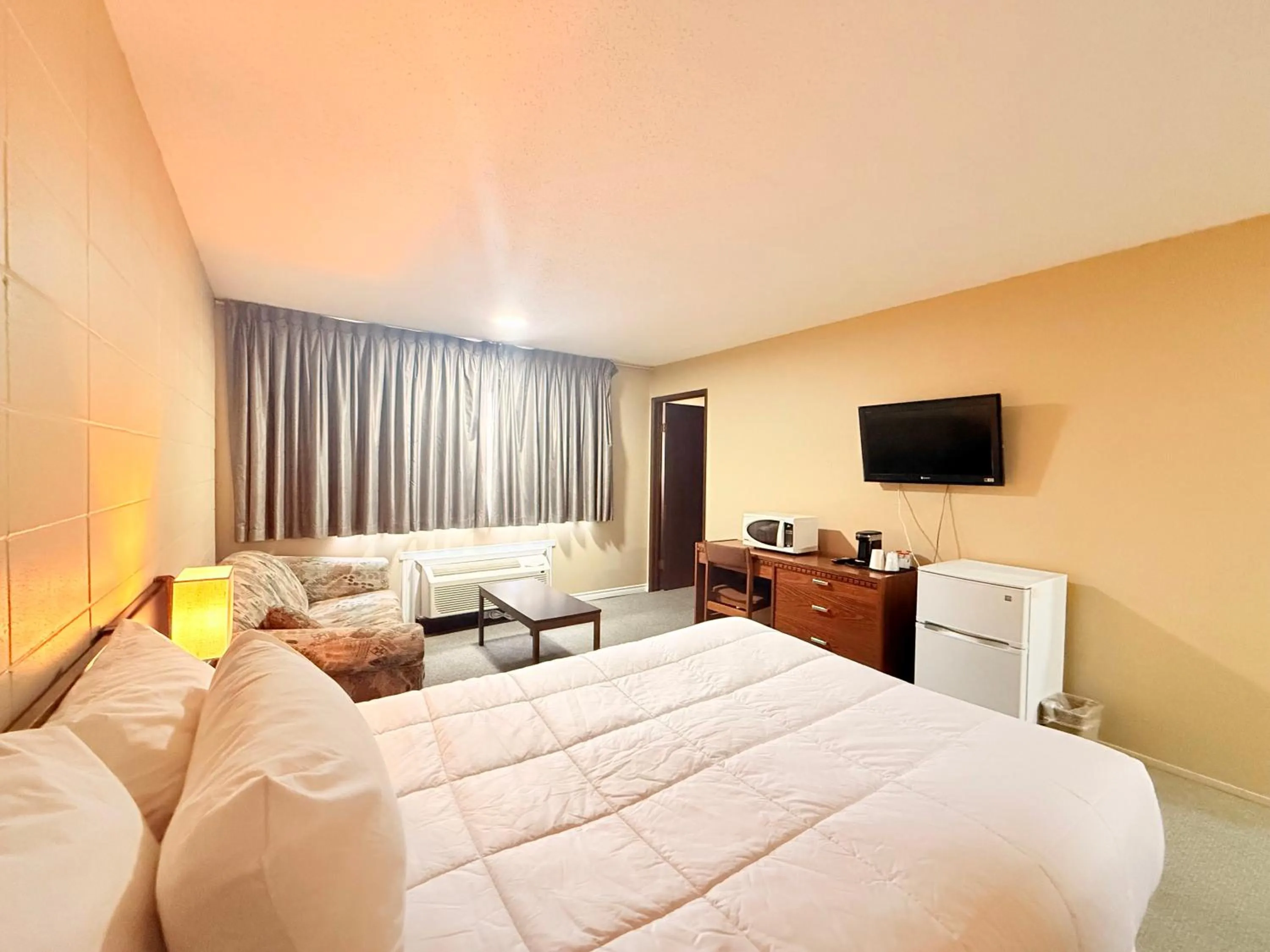 Bed in Capri Motor Inn