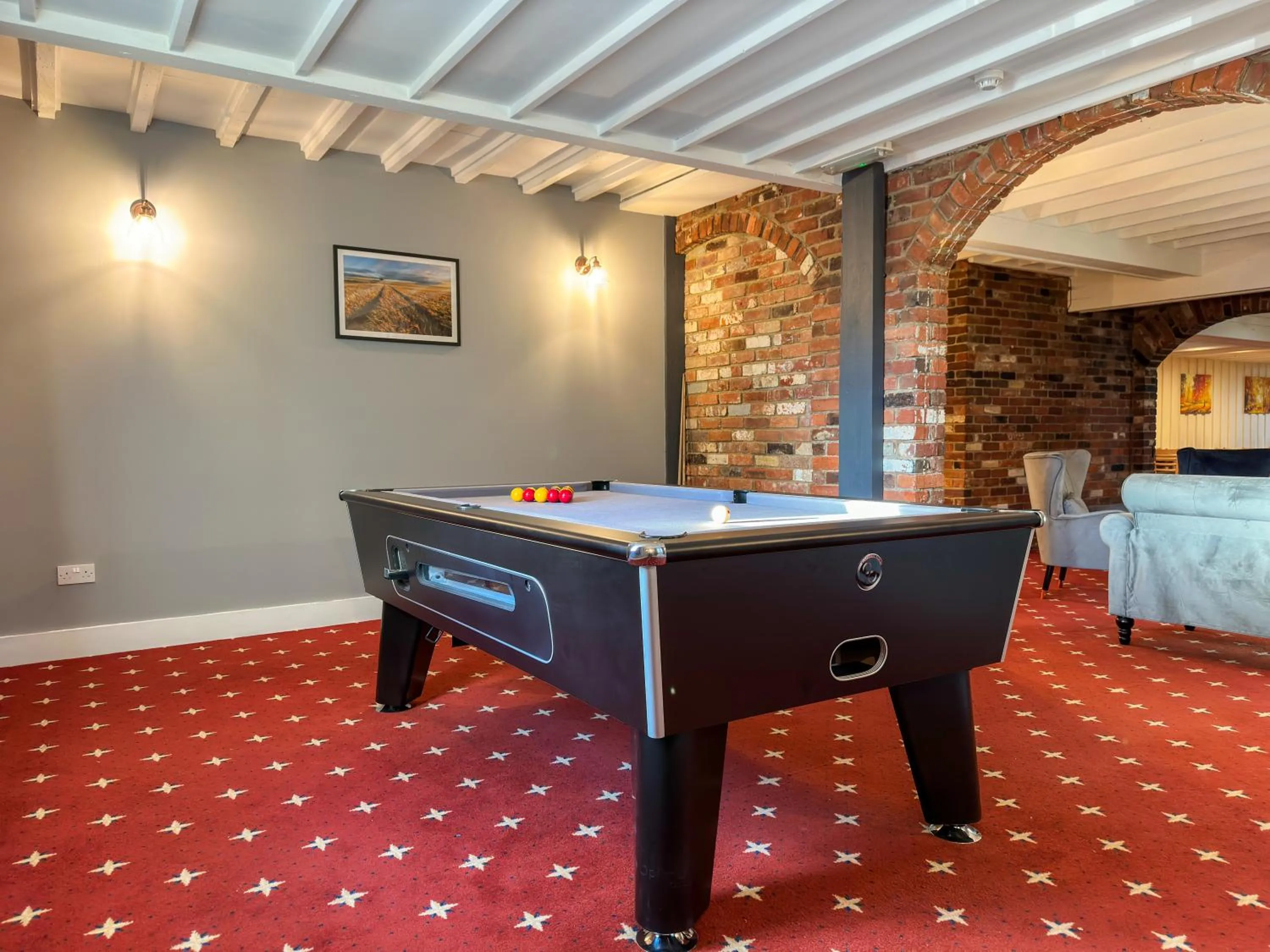 Communal lounge/ TV room in The Angel Hotel