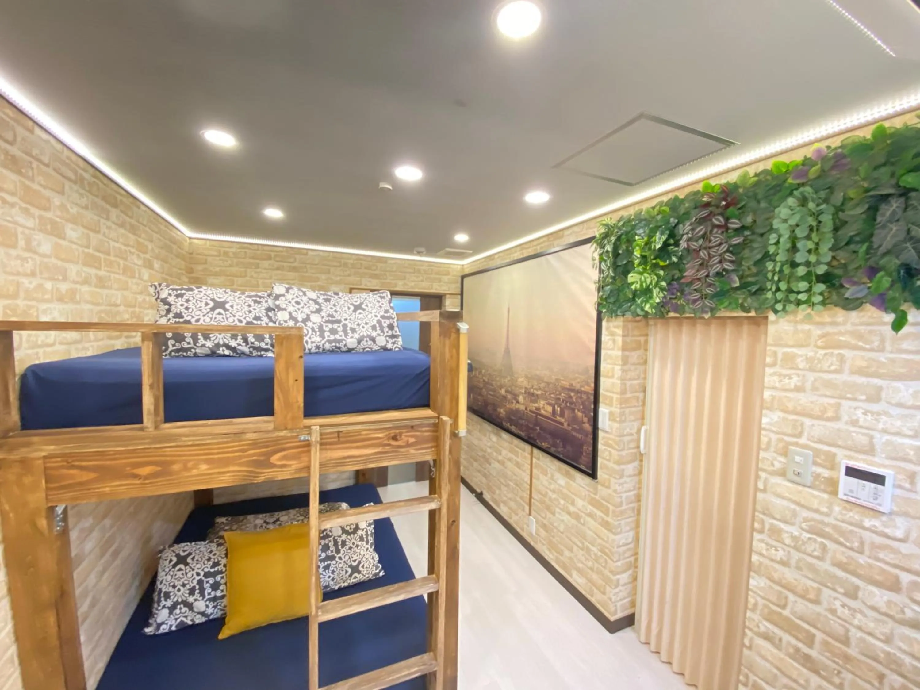 Bed in Hotel Orange House