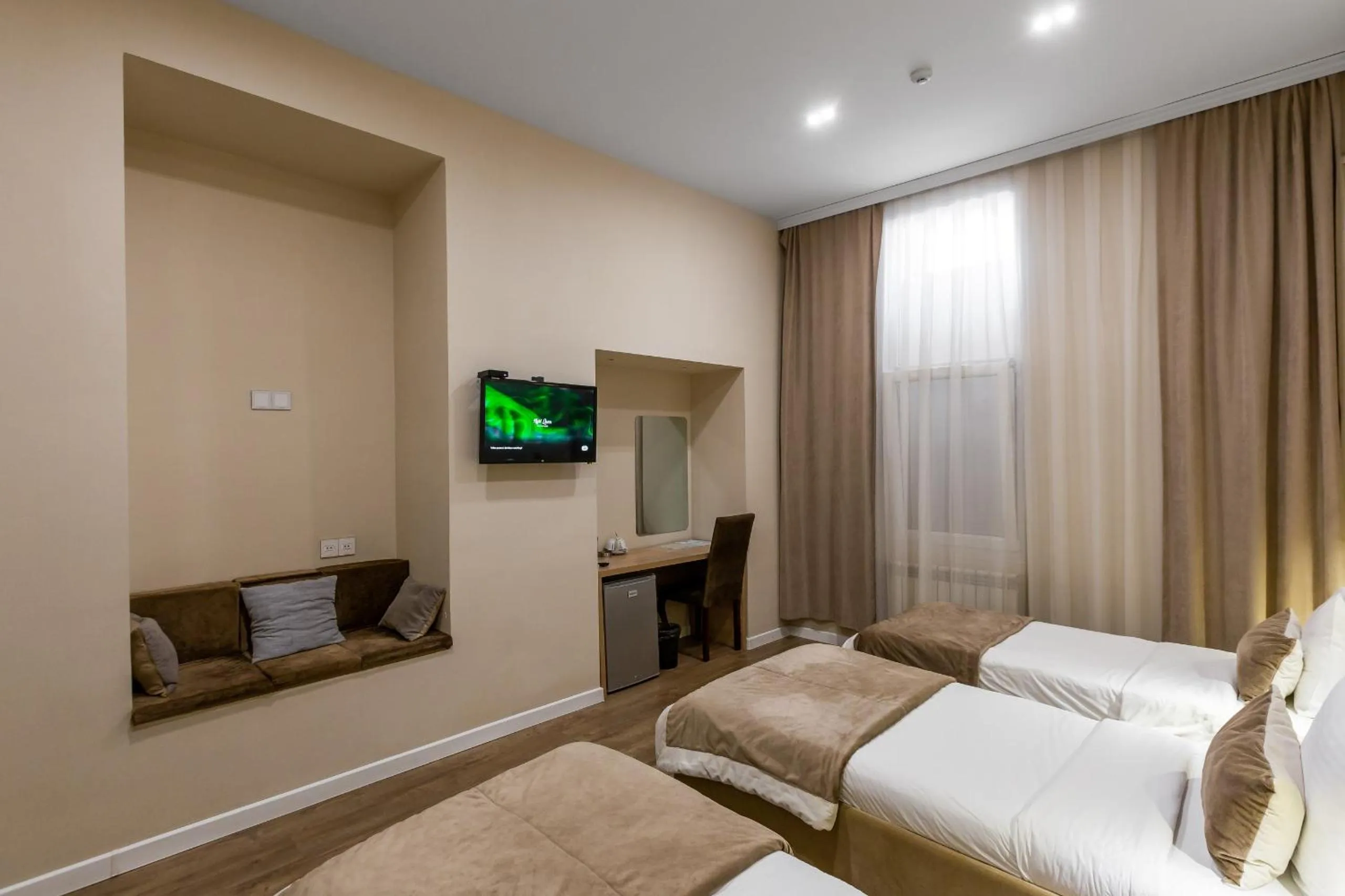 Bed in Seven Boutique Hotel Baku