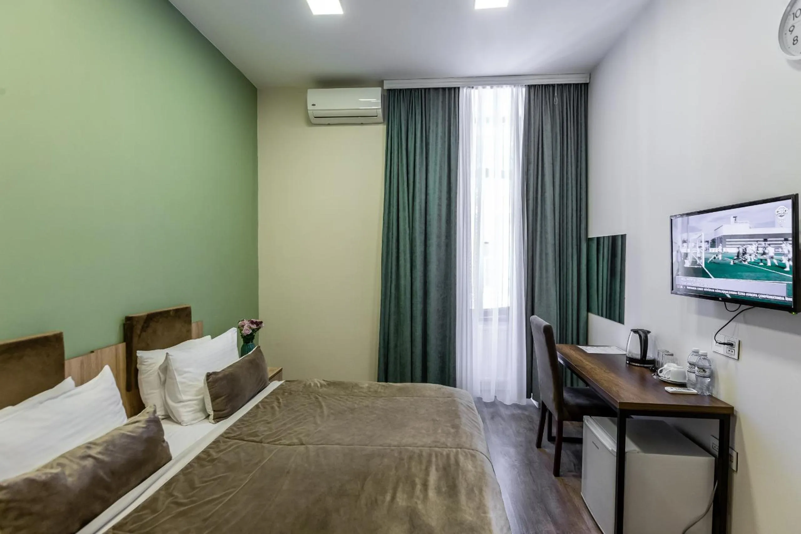 Bed in Seven Boutique Hotel Baku