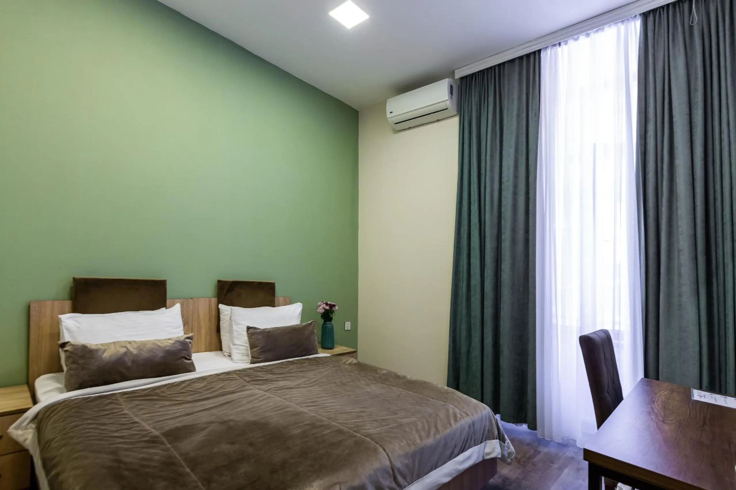 Bed in Seven Boutique Hotel Baku