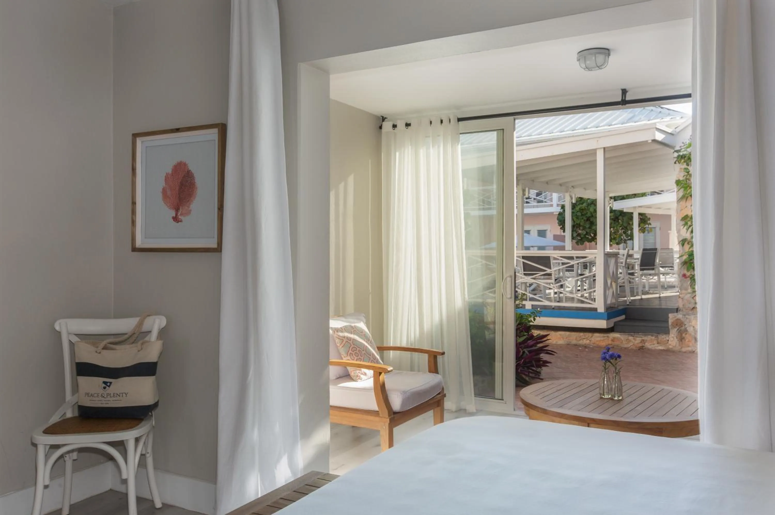 Balcony/Terrace, Bed in Peace and Plenty Resort