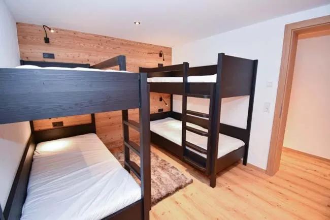 Bed in Astn Hütten Residenz Waldsicht Königsleiten - Ferienwohnungen
