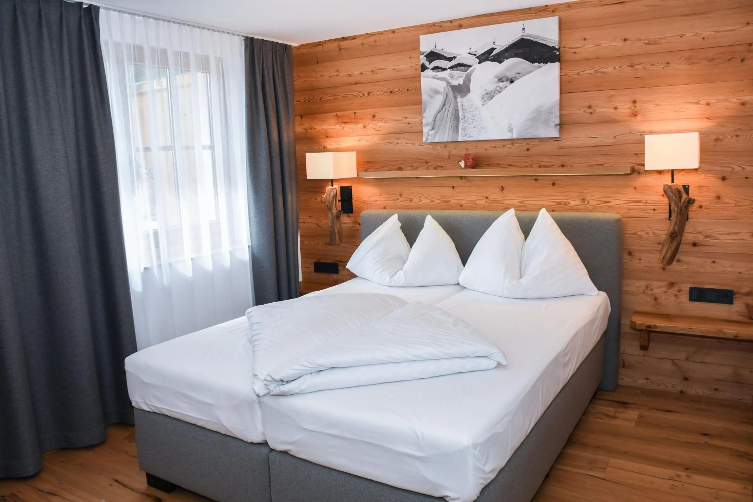 Bed in Astn Hütten Residenz Waldsicht Königsleiten - Ferienwohnungen