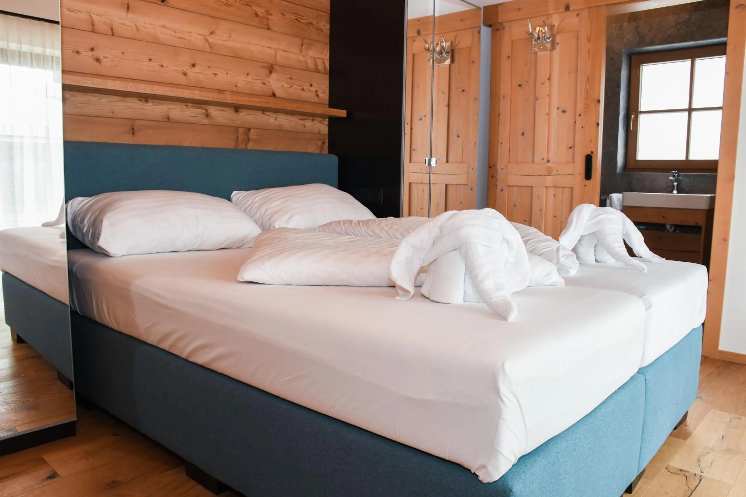 Bed in Astn Hütten Residenz Waldsicht Königsleiten - Ferienwohnungen