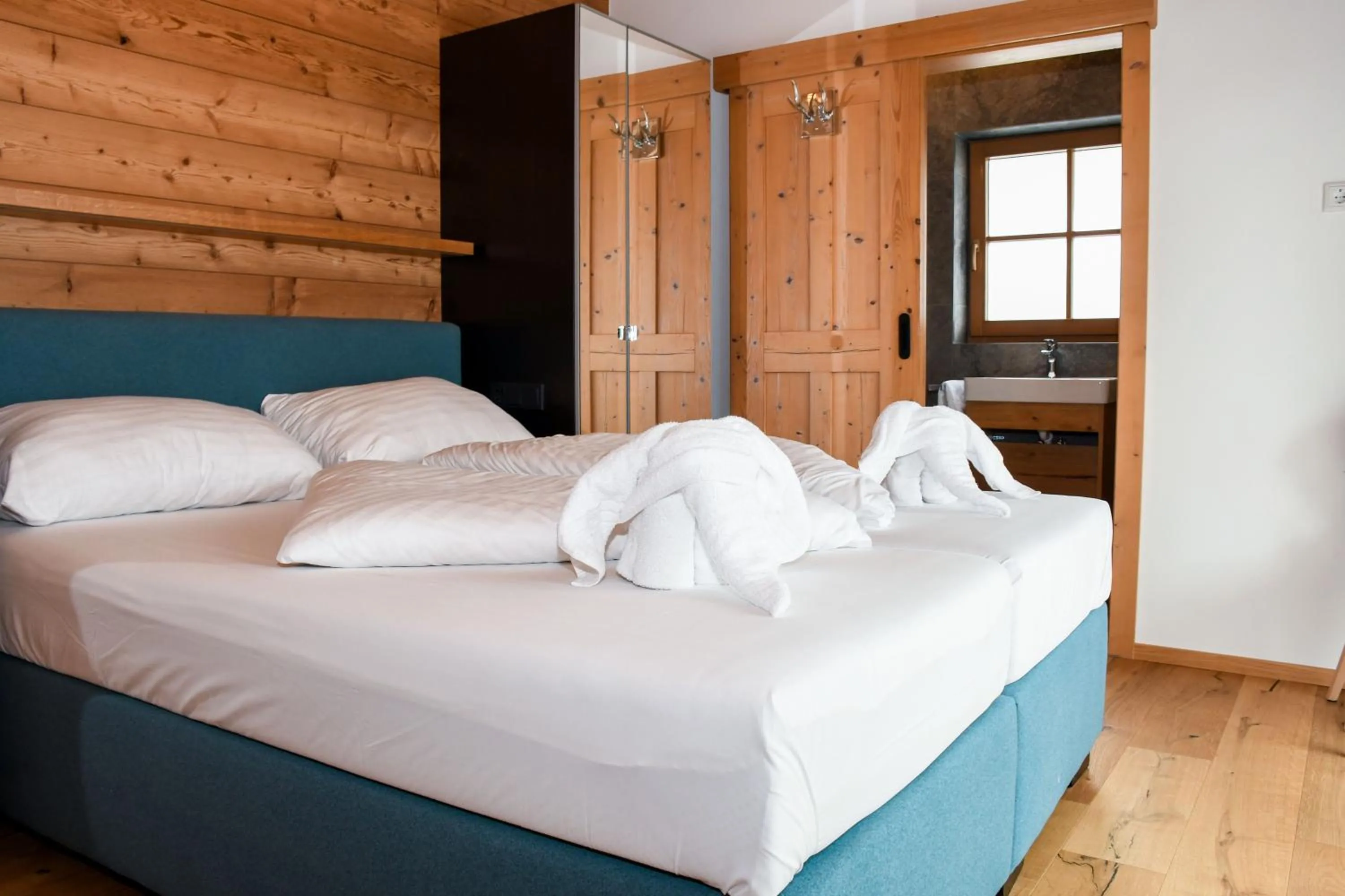 Bed in Astn Hütten Residenz Waldsicht Königsleiten - Ferienwohnungen