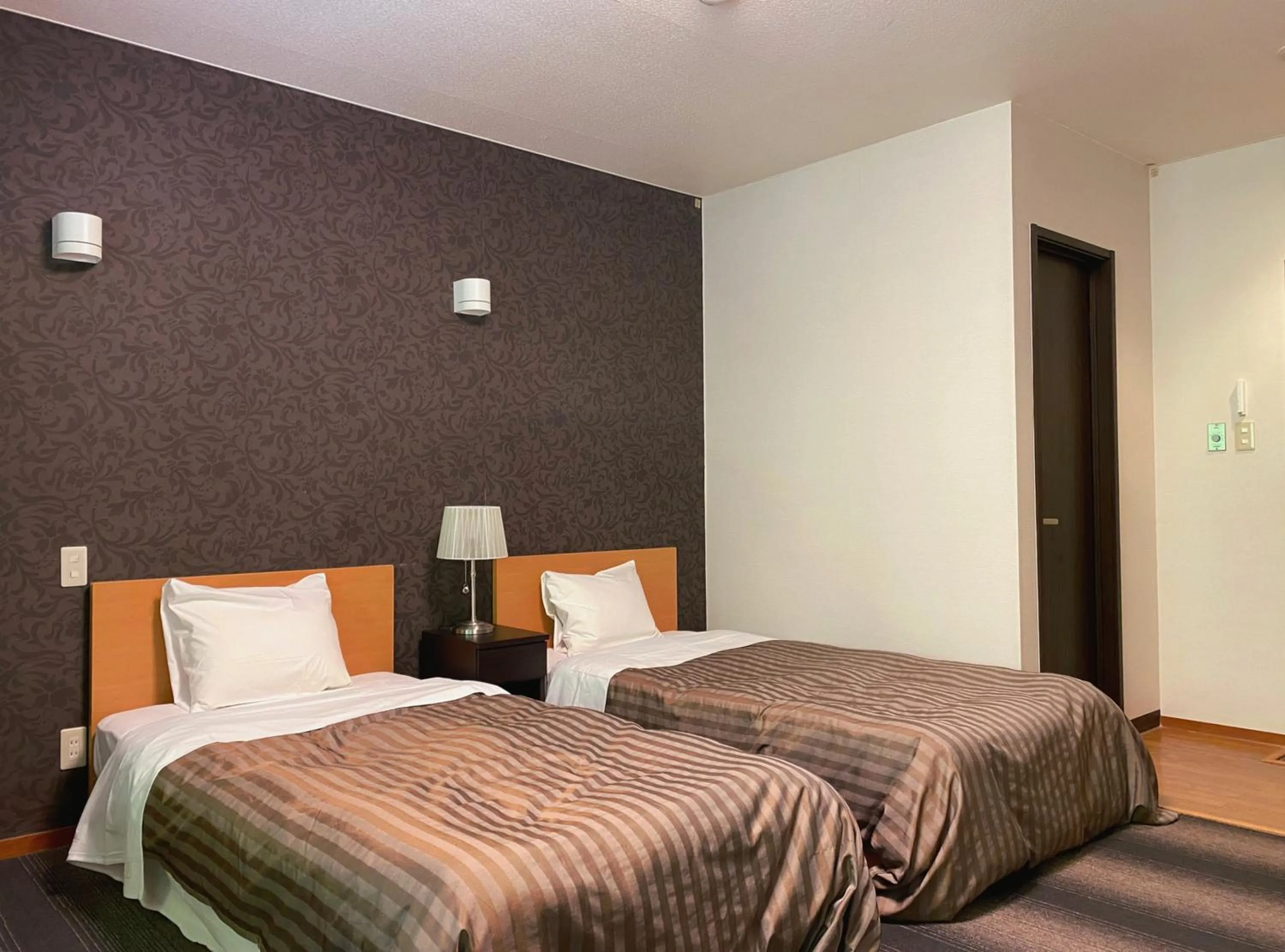 Bed in Itoen Hotel Shima