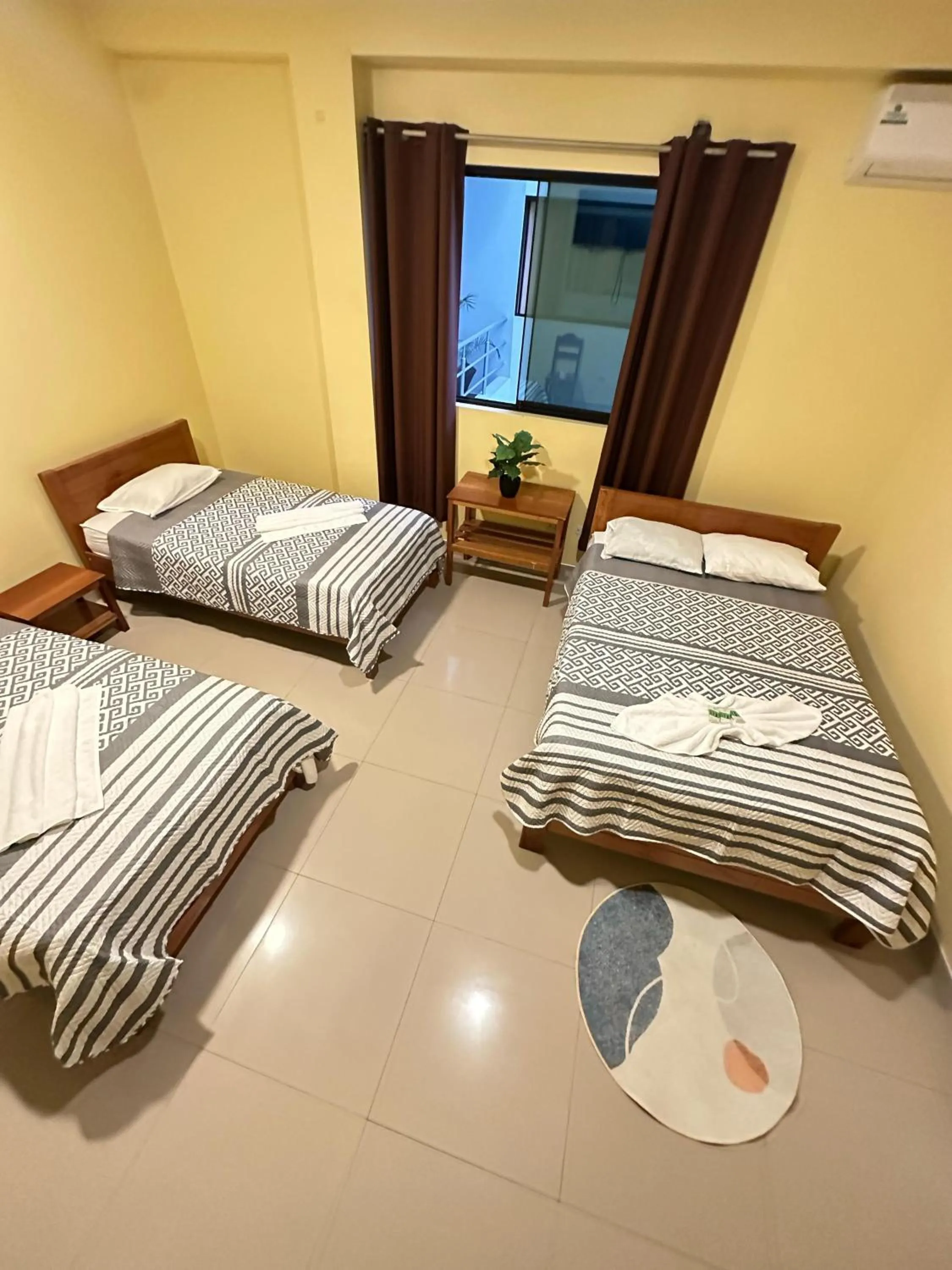 Bed in Hostal Cordillera Azul