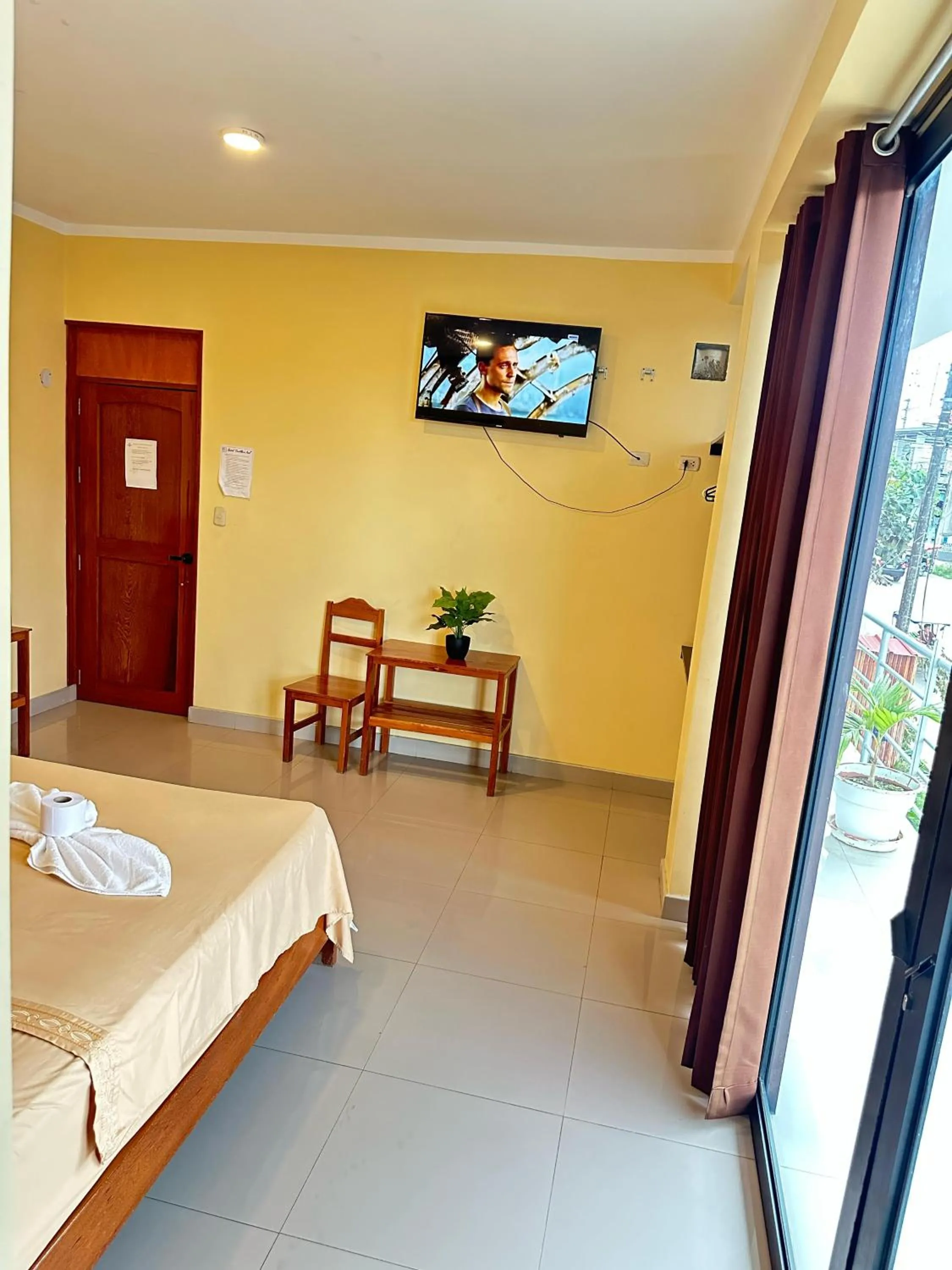 Bed in Hostal Cordillera Azul