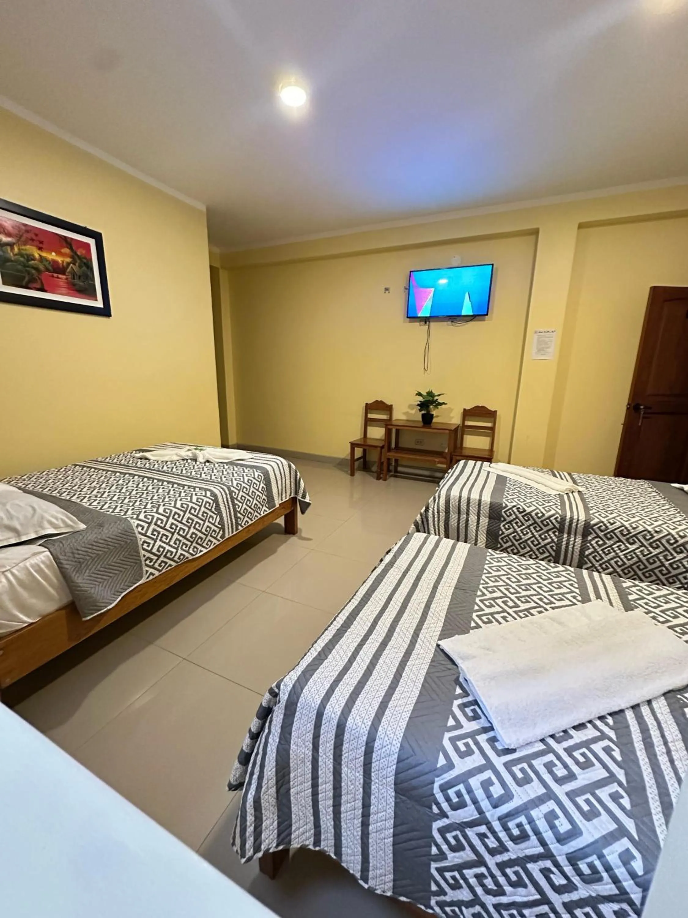 Bed in Hostal Cordillera Azul