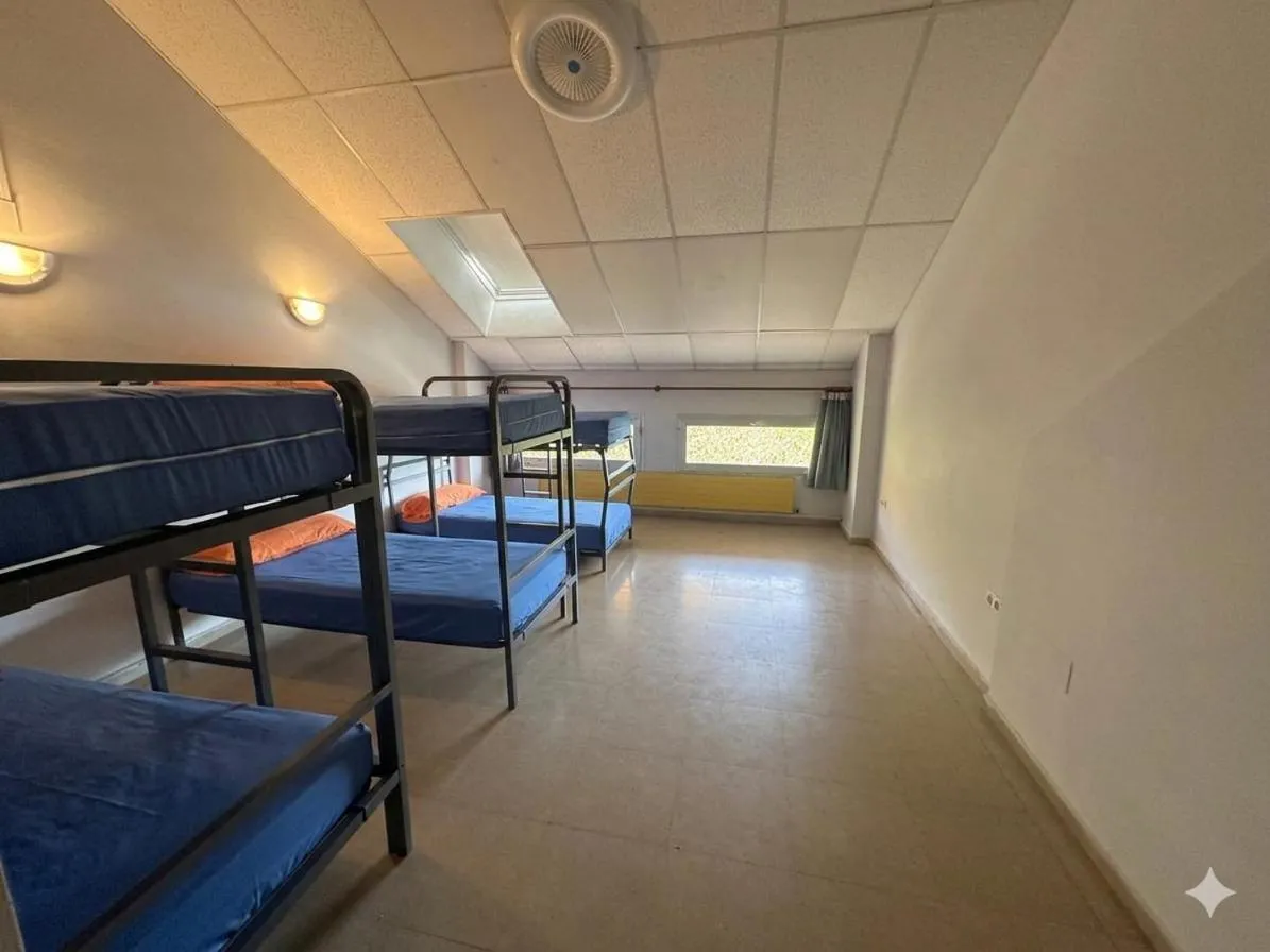 Bed in Residencia Albergue Jaca