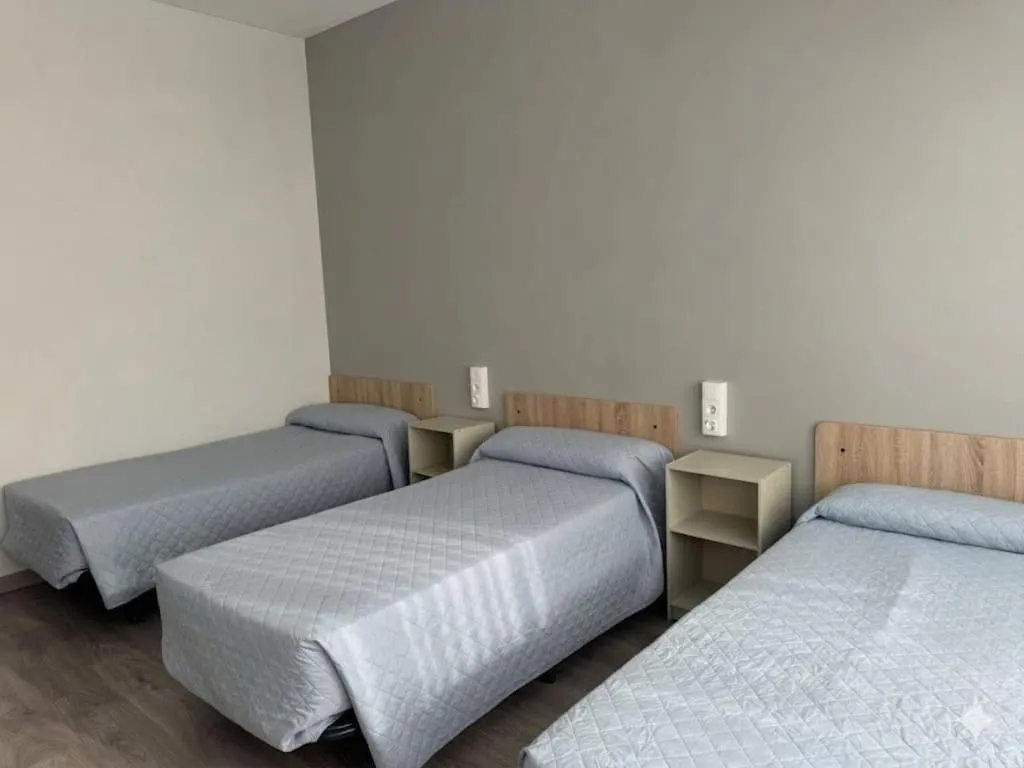 Bed in Residencia Albergue Jaca