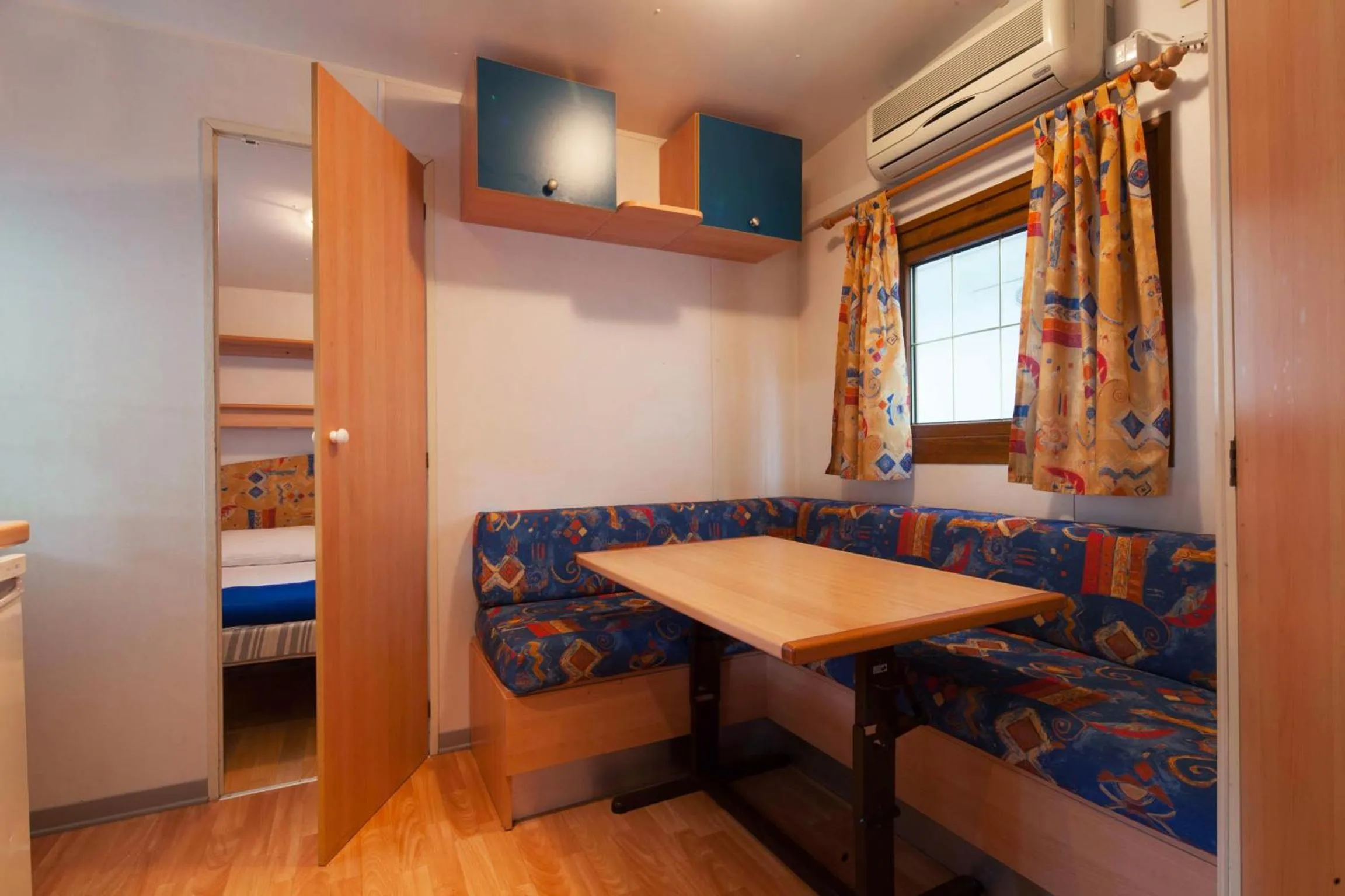 Dining area, Bed in Camping Village Cavallino