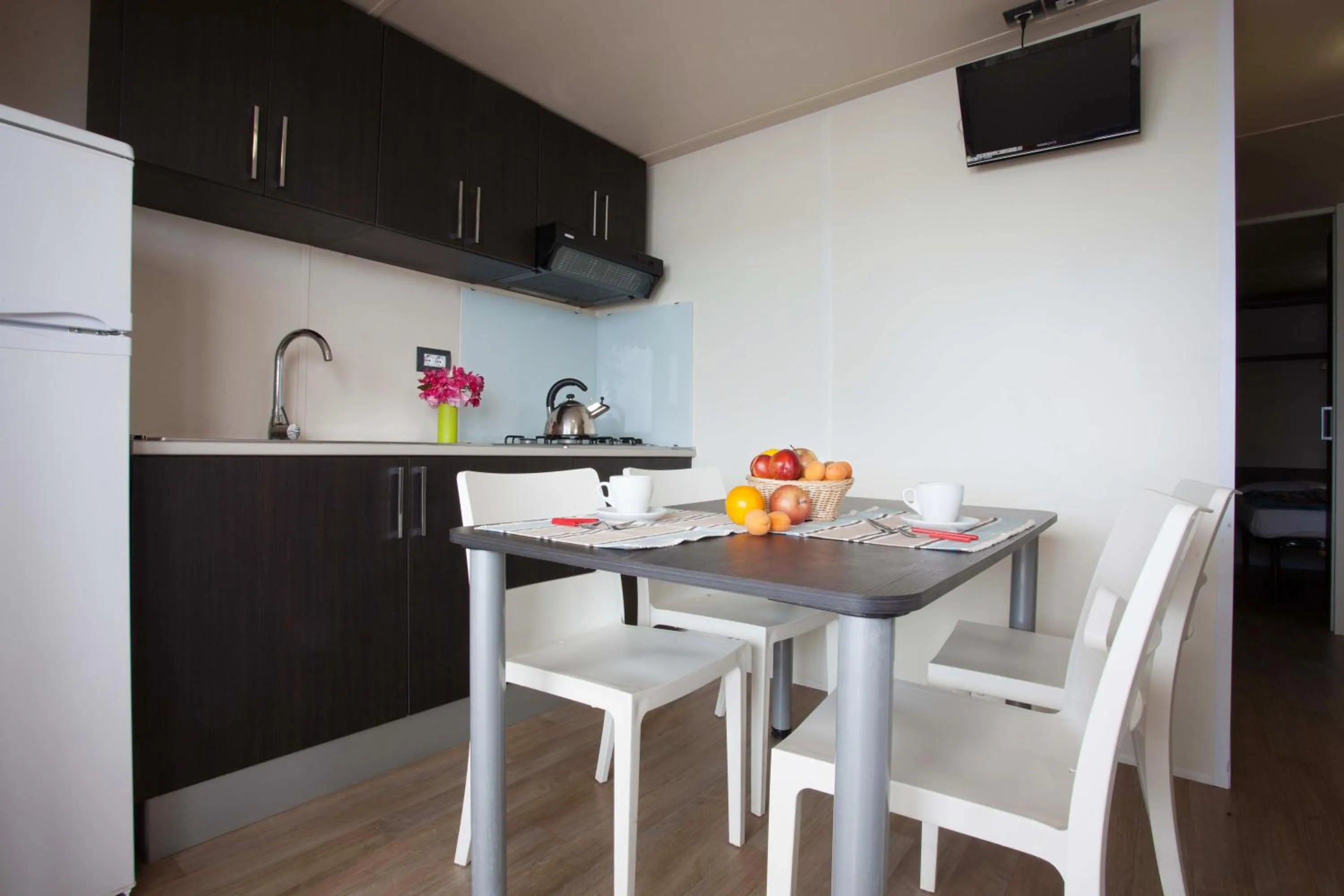 Kitchen or kitchenette in Camping Village Cavallino