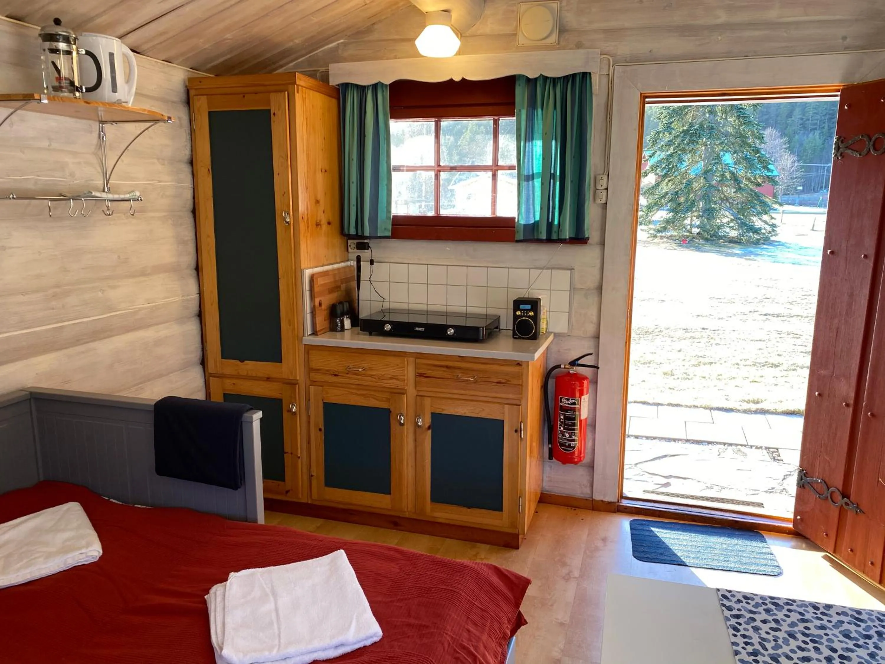 Kitchen or kitchenette, Bed in Sandviken Camping