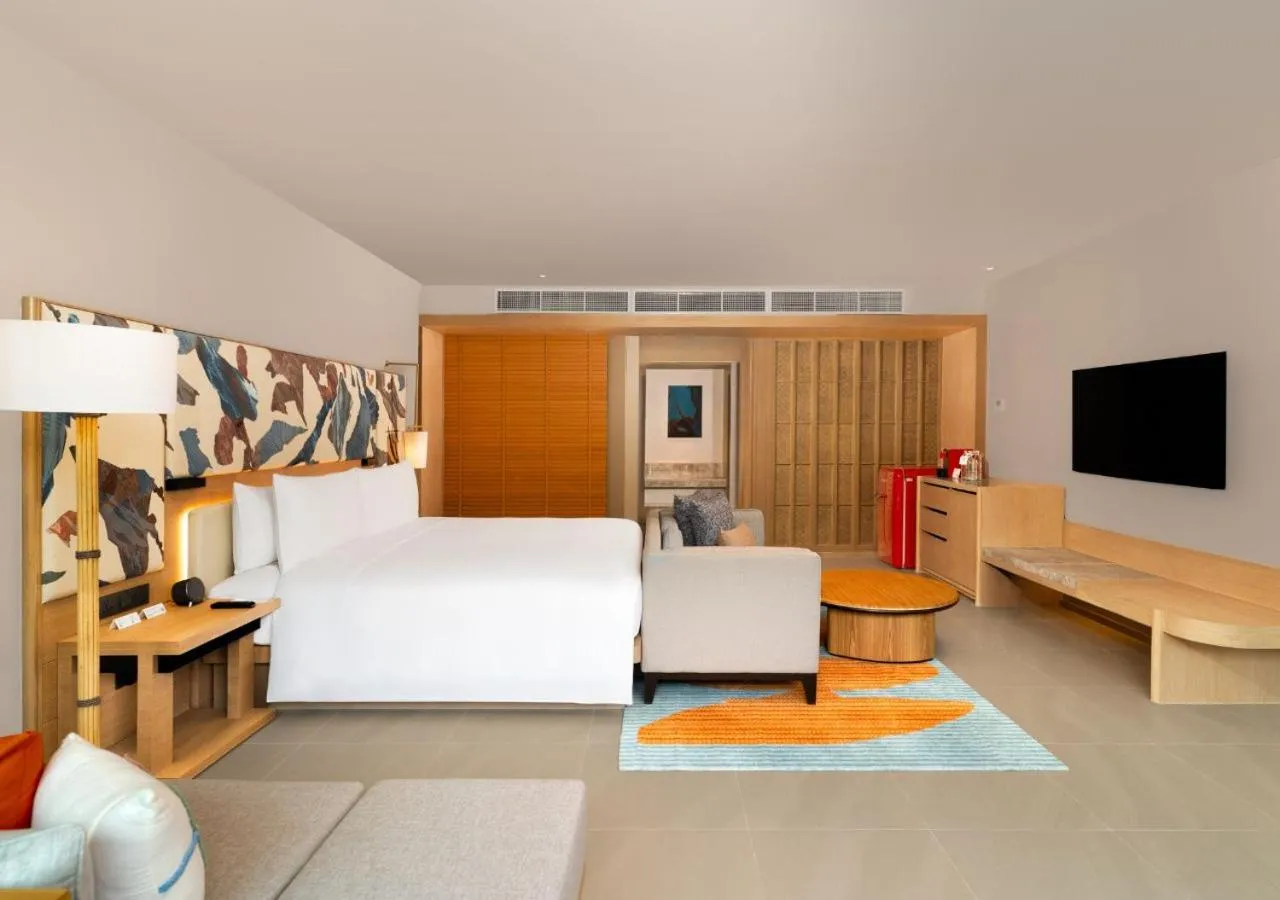 Bed in Le Meridien Phuket Mai Khao Beach Resort