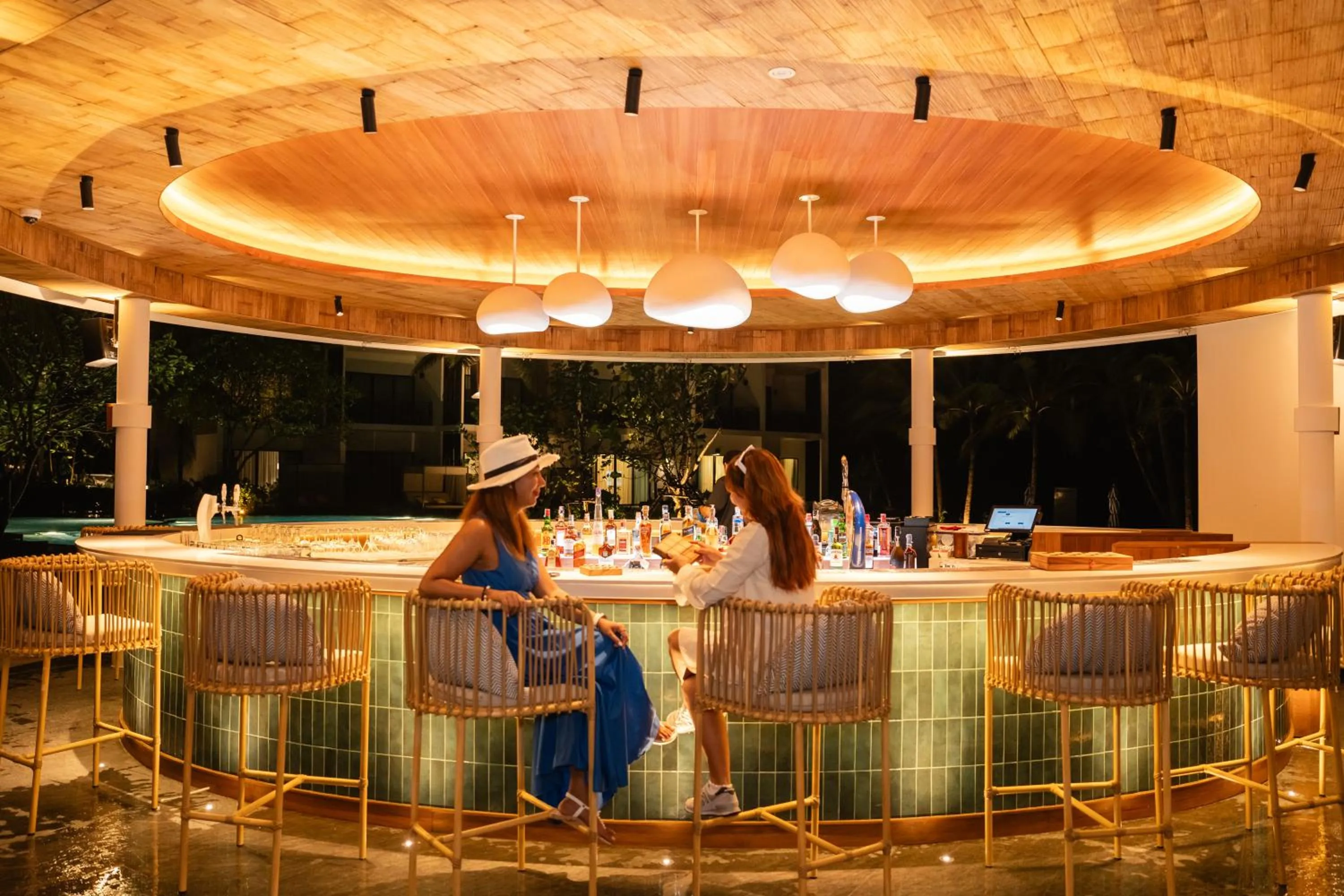 People in Le Meridien Phuket Mai Khao Beach Resort