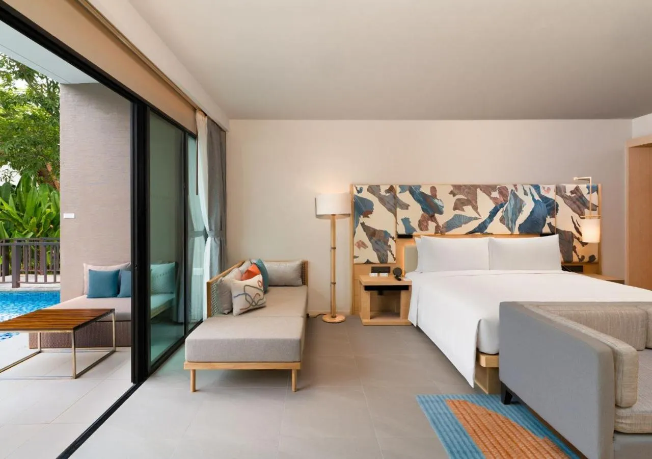 Bed in Le Meridien Phuket Mai Khao Beach Resort