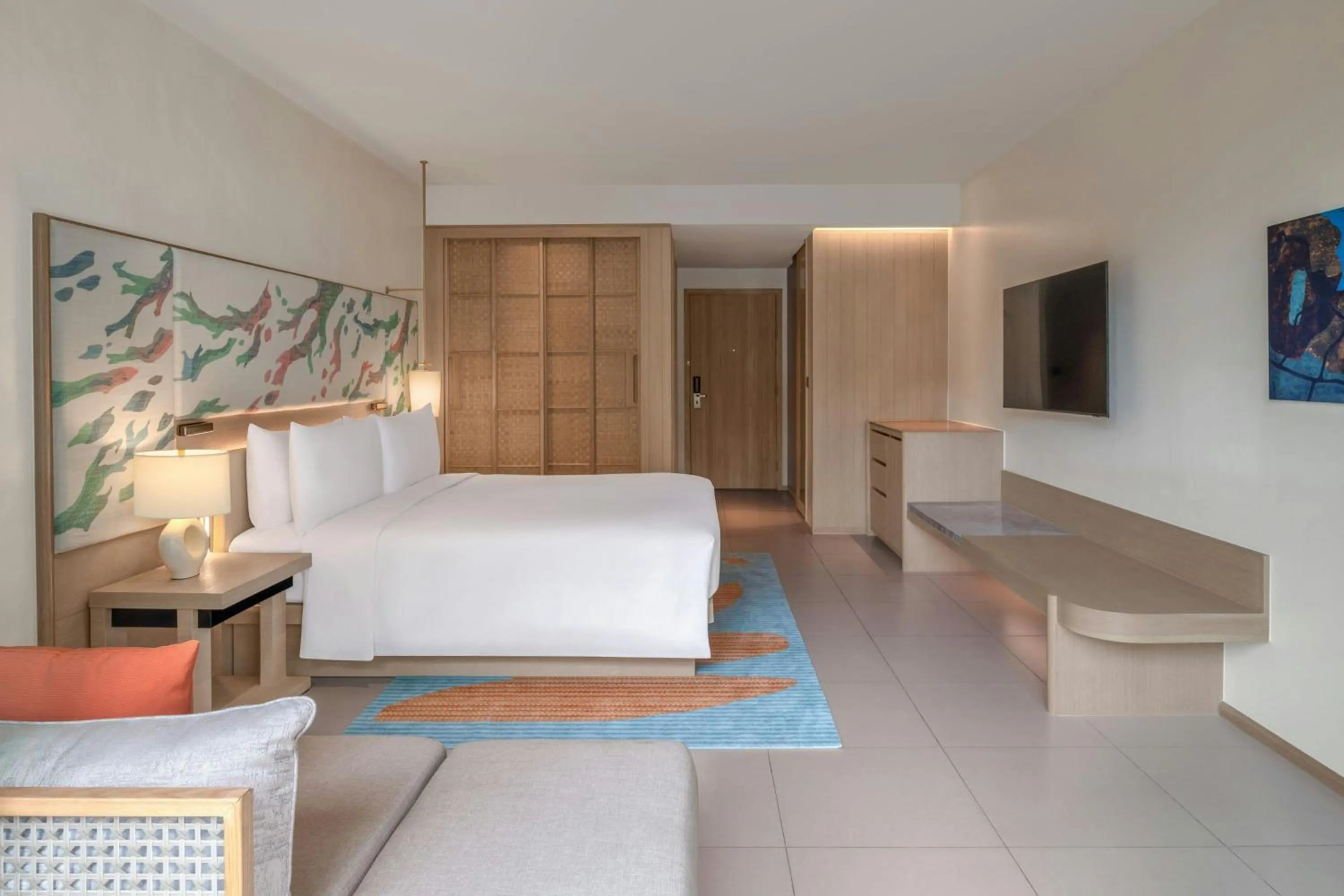 Photo of the whole room, Bed in Le Meridien Phuket Mai Khao Beach Resort