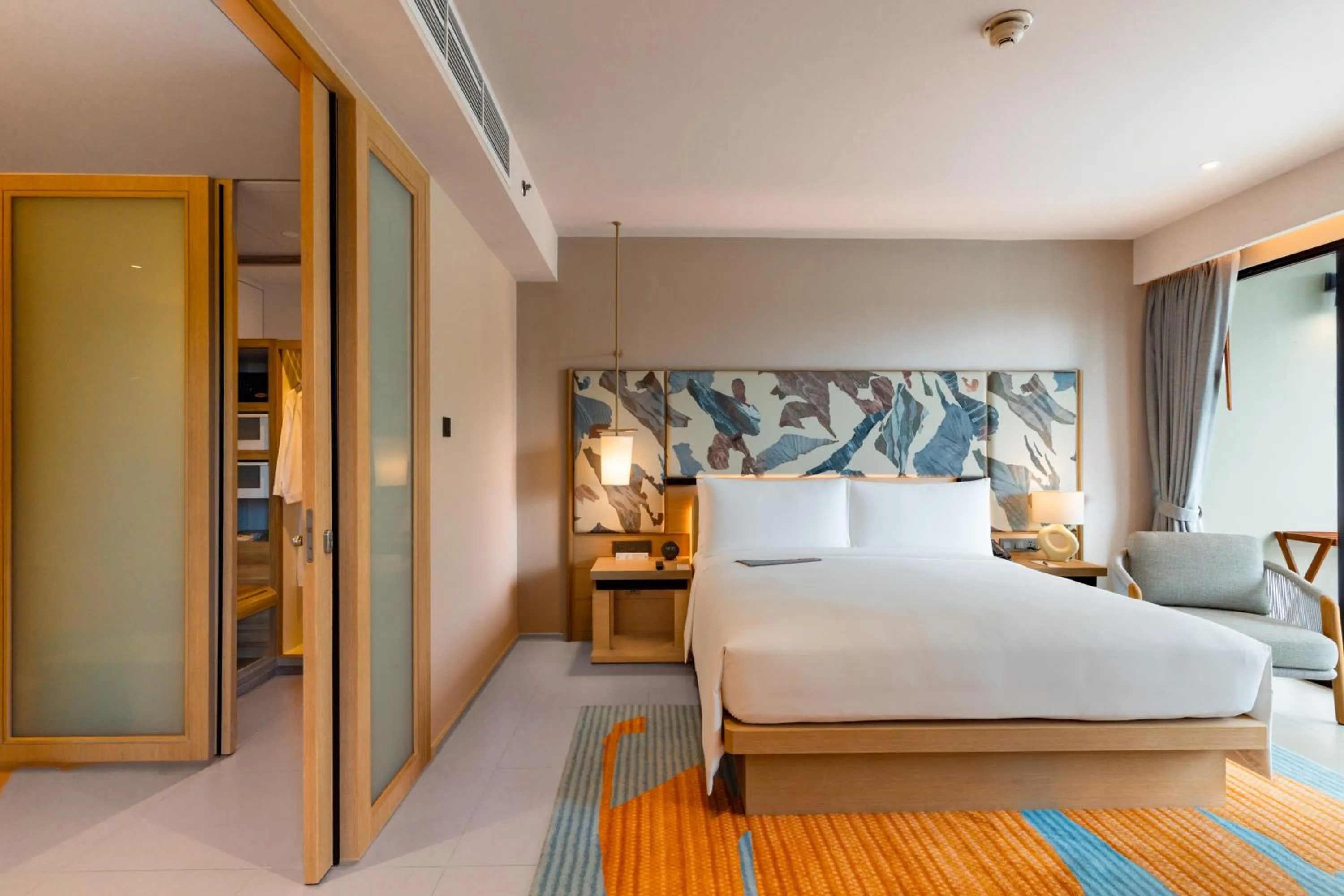 Bed in Le Meridien Phuket Mai Khao Beach Resort