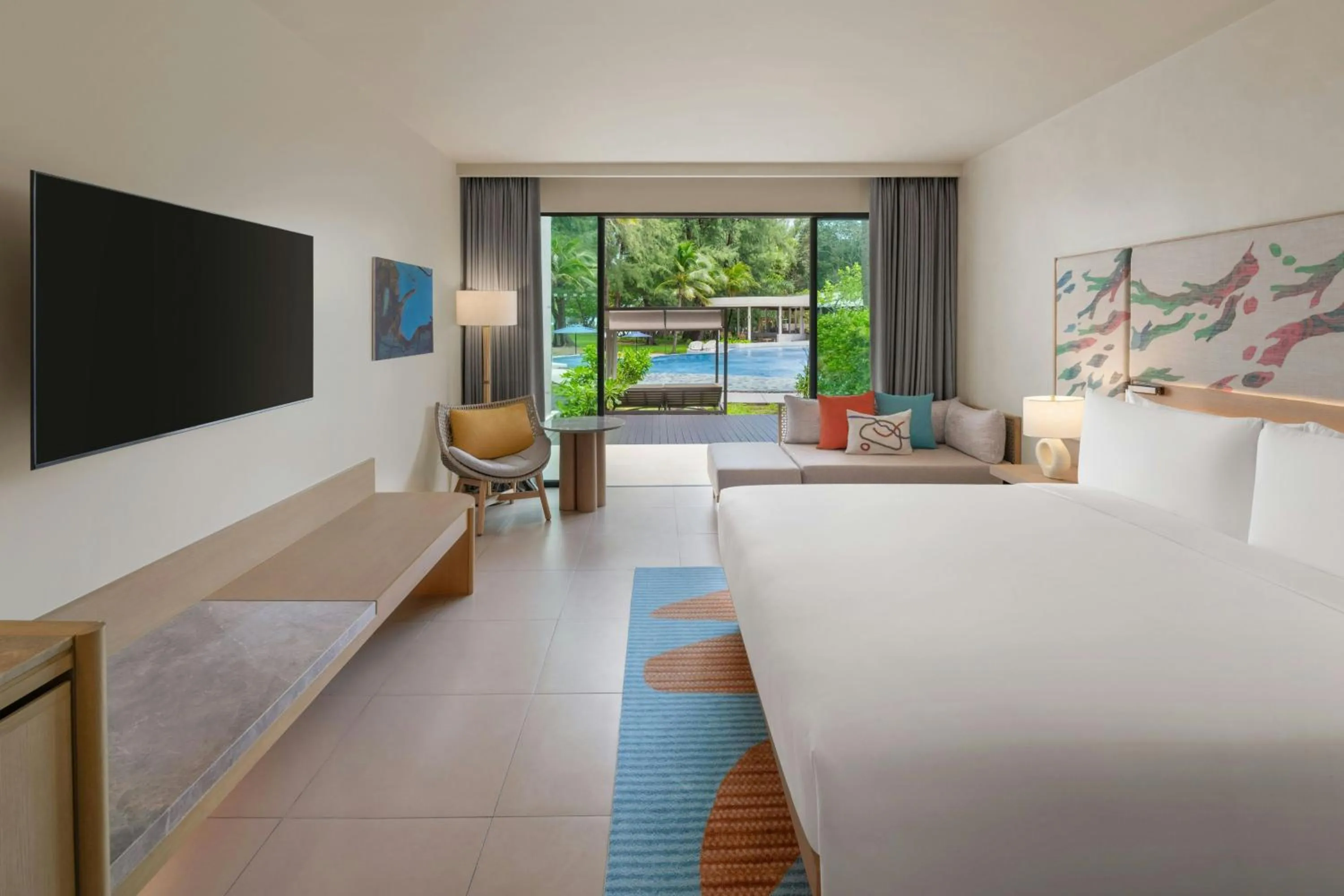Photo of the whole room, Bed in Le Meridien Phuket Mai Khao Beach Resort