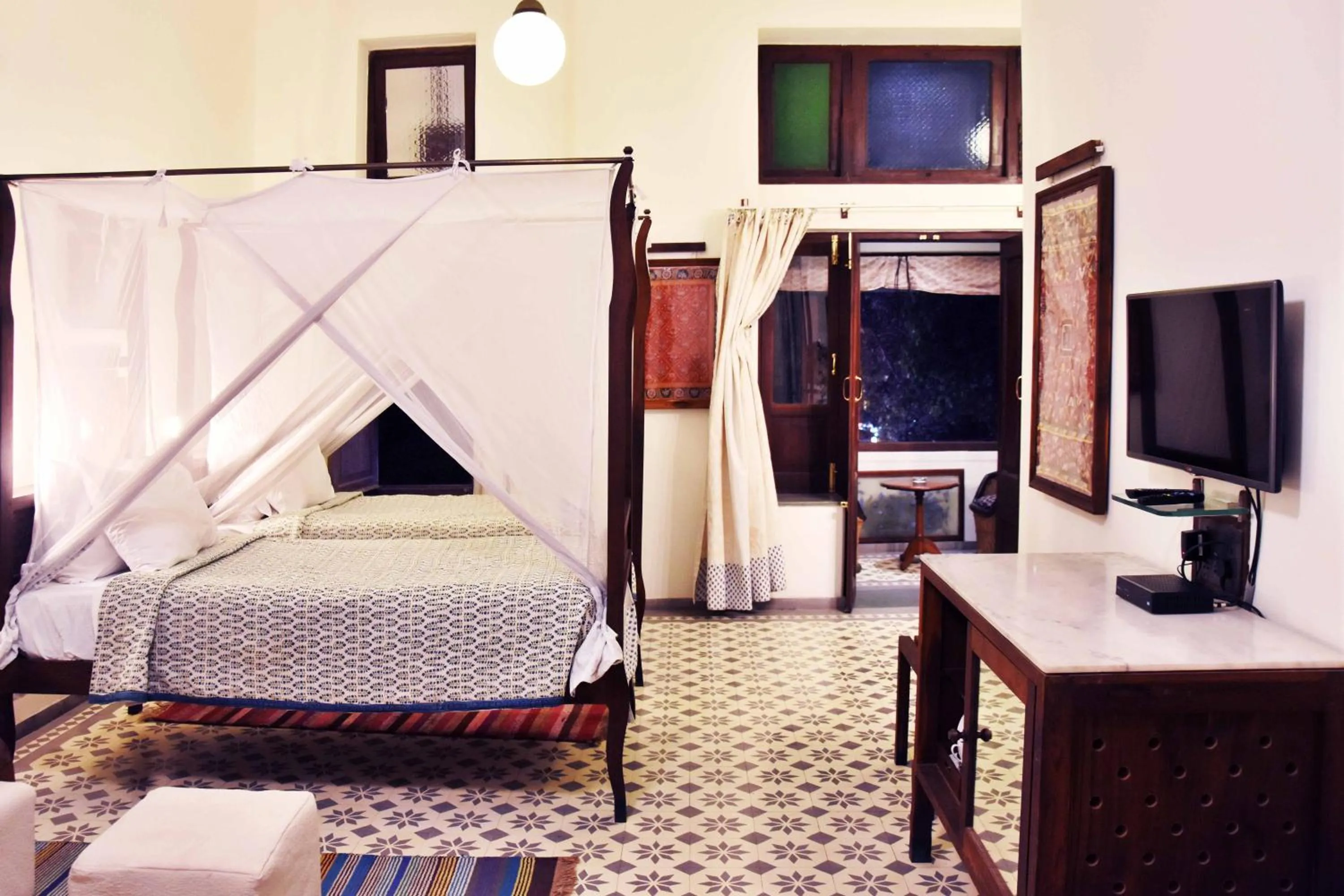 Bed in The House of MG-A Heritage Hotel, Ahmedabad
