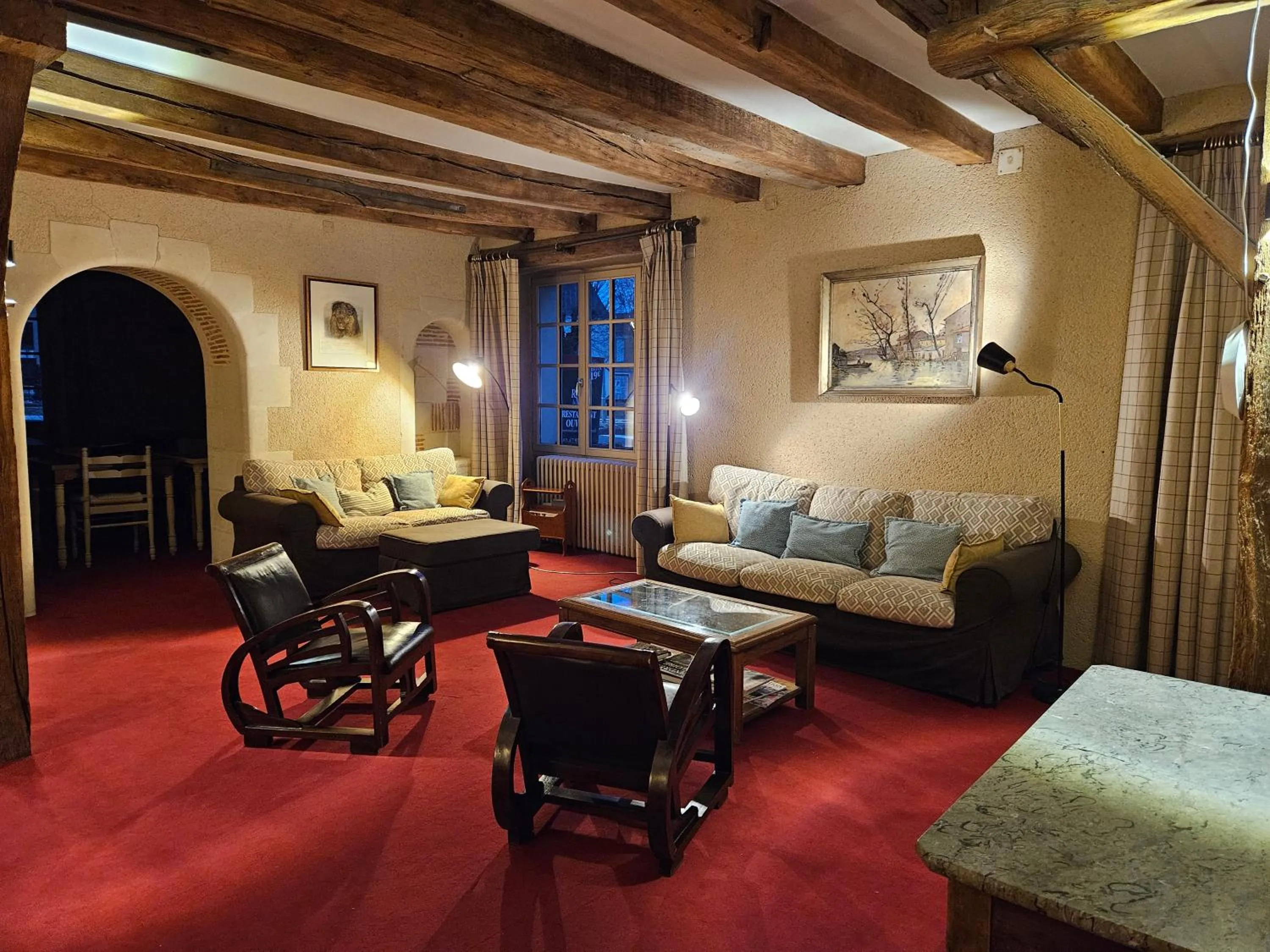 Living room in Logis Hôtel Restaurant Relais de la Mothe