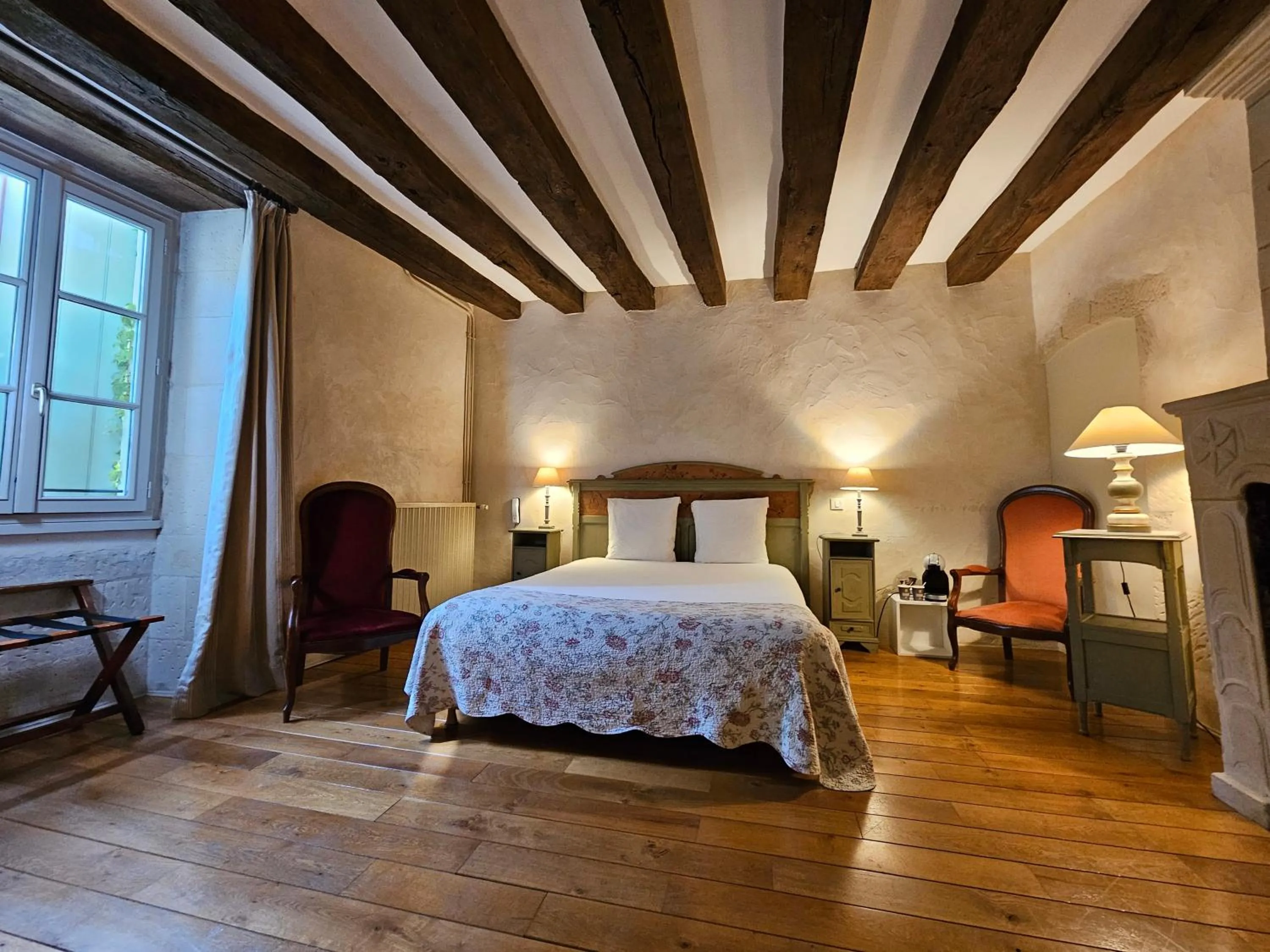 Photo of the whole room, Bed in Logis Hôtel Restaurant Relais de la Mothe