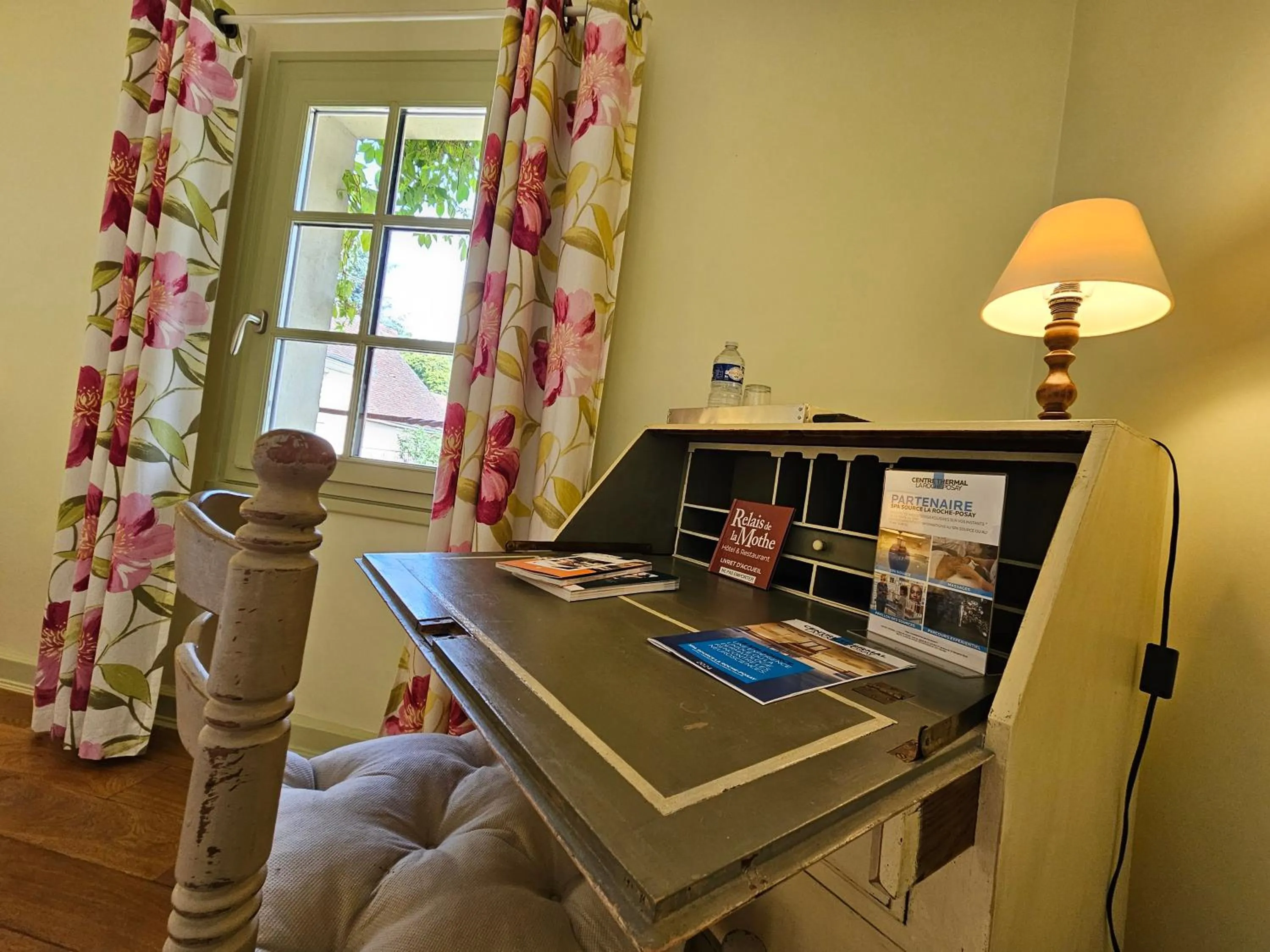 Bedroom in Logis Hôtel Restaurant Relais de la Mothe