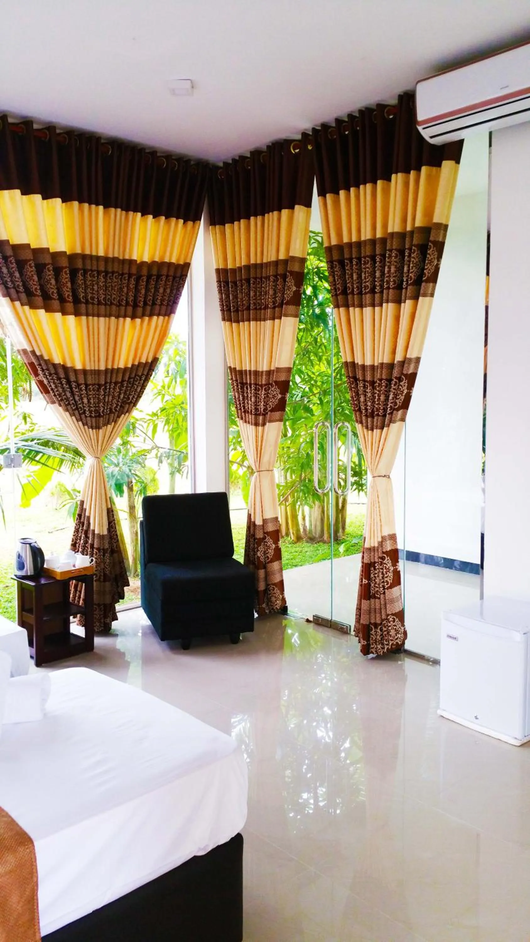 View (from property/room), Bed in Rivonway Hotel Polonnaruwa