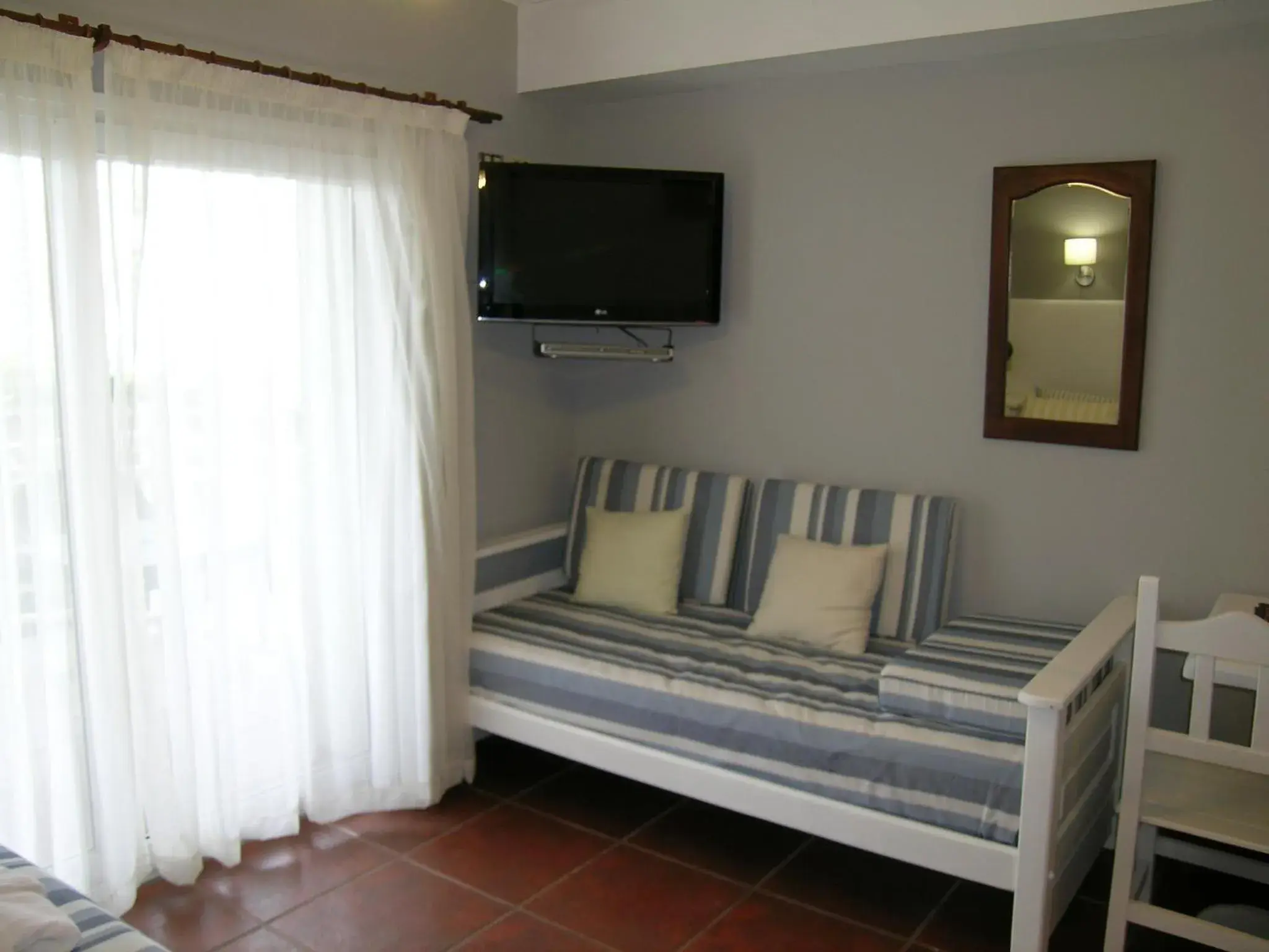 Living room, Bed in Costa Carilo Apart de Mar By HS Living room, Bed in Costa Carilo Apart de Mar By HS