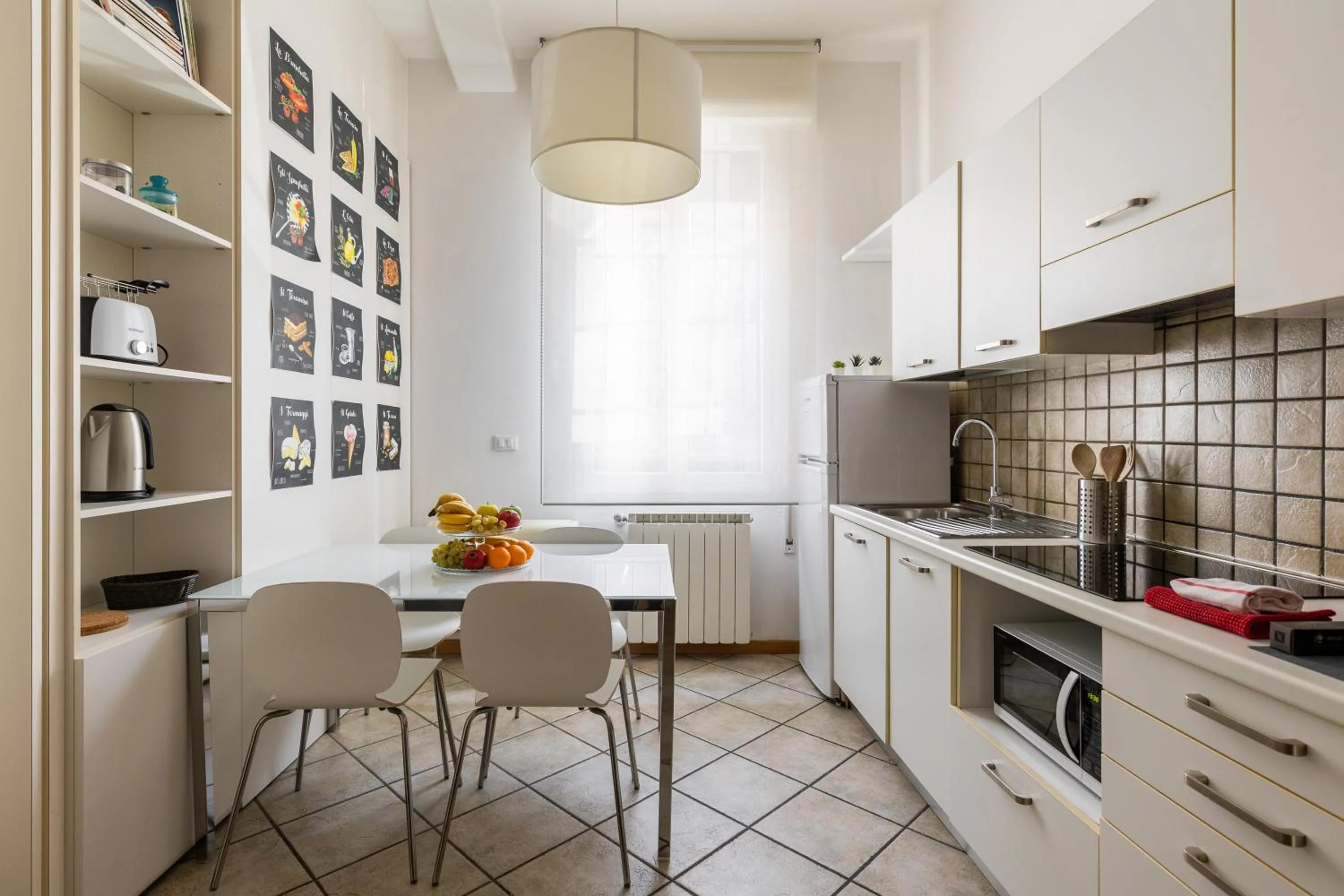 Kitchen or kitchenette in Portobello Apartments