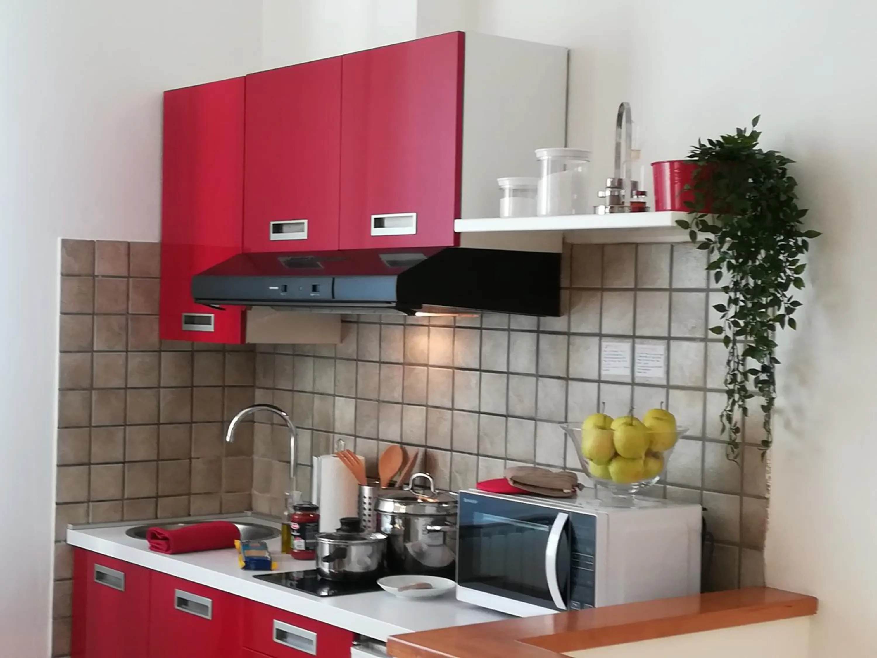 Kitchen or kitchenette in Portobello Apartments