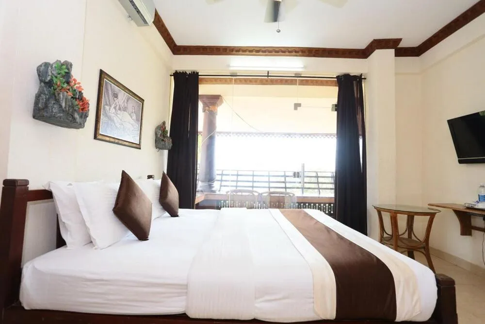 Bedroom, Bed in Kovalam Beach Hotel