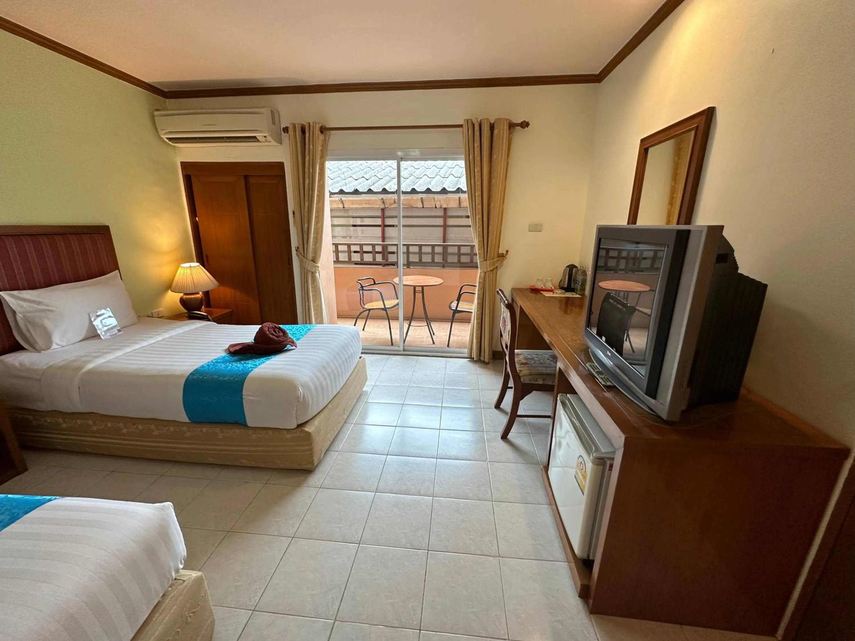 Photo of the whole room, Bed in Thipurai Beach Hotel