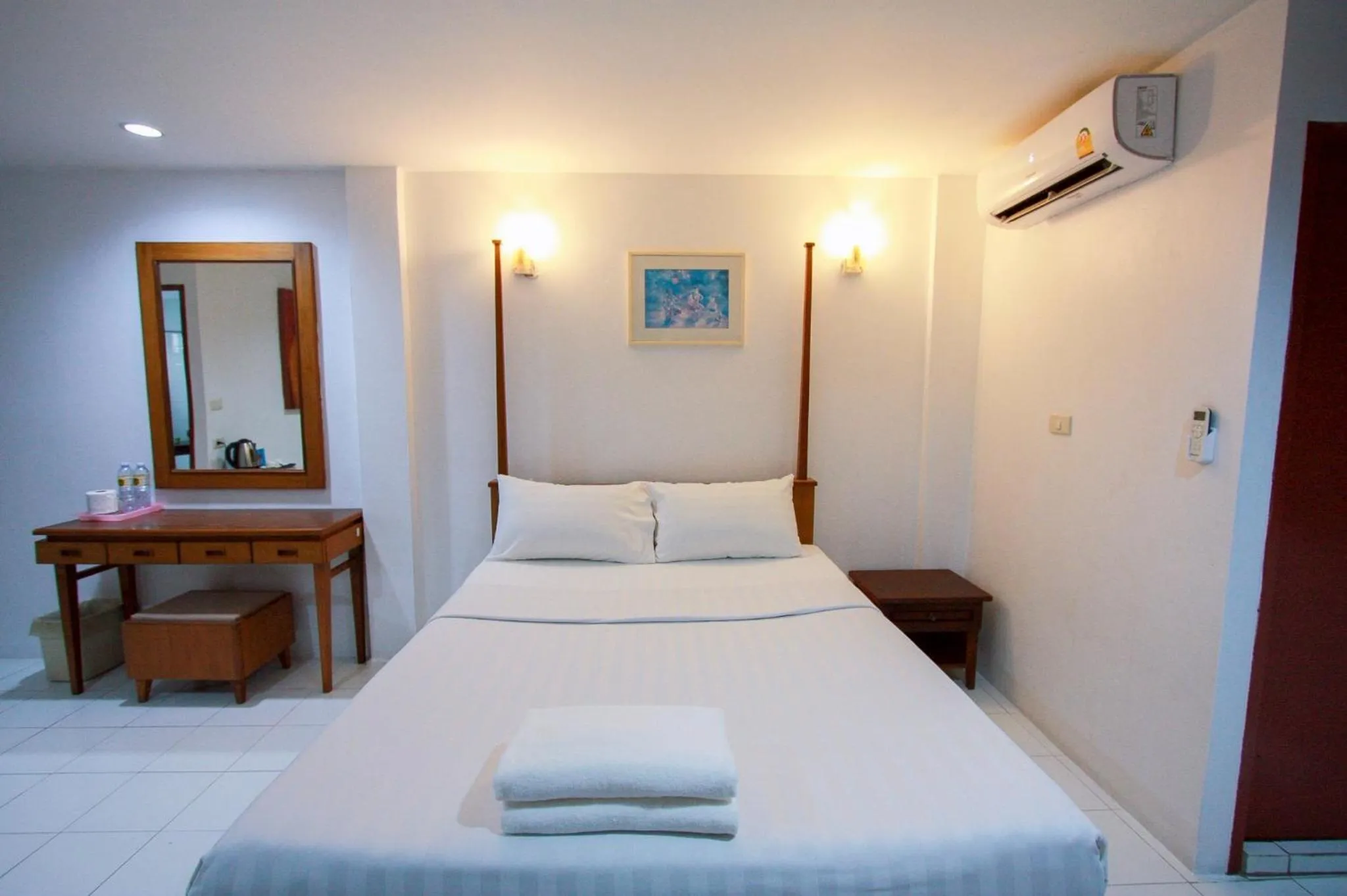 Bed in 18 Coins Budget Hotel