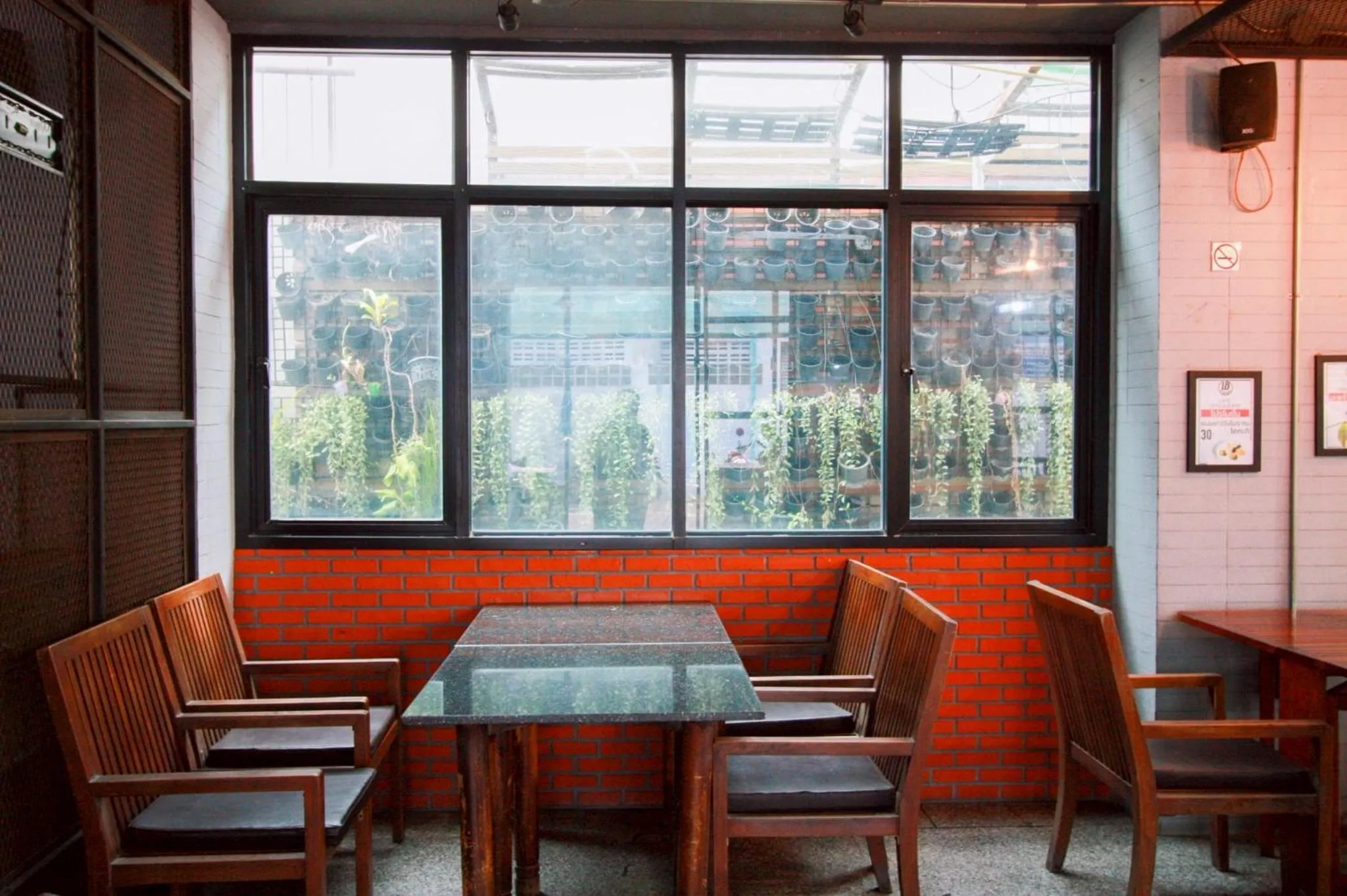 Seating area in 18 Coins Budget Hotel