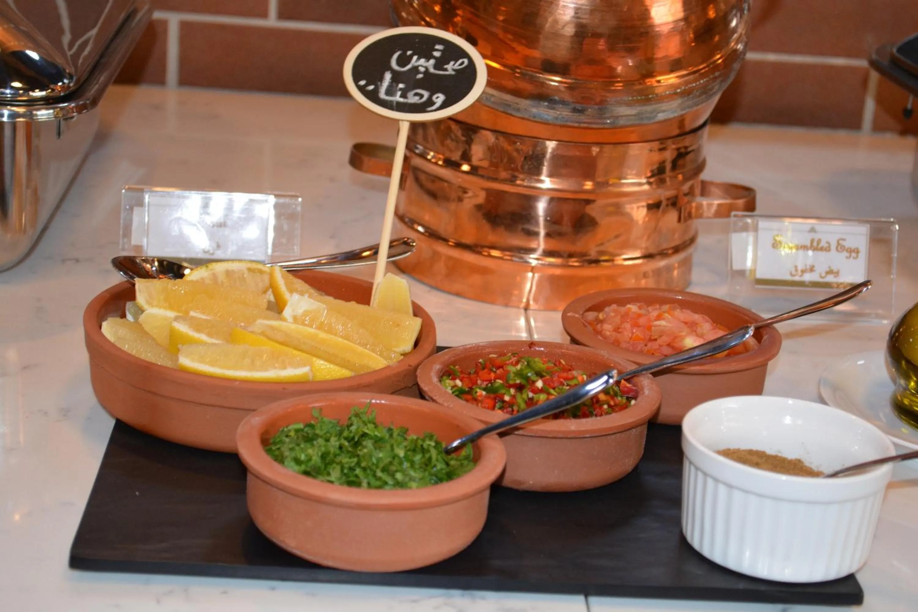 Buffet breakfast in Makeen Homes by Warwick Hotel