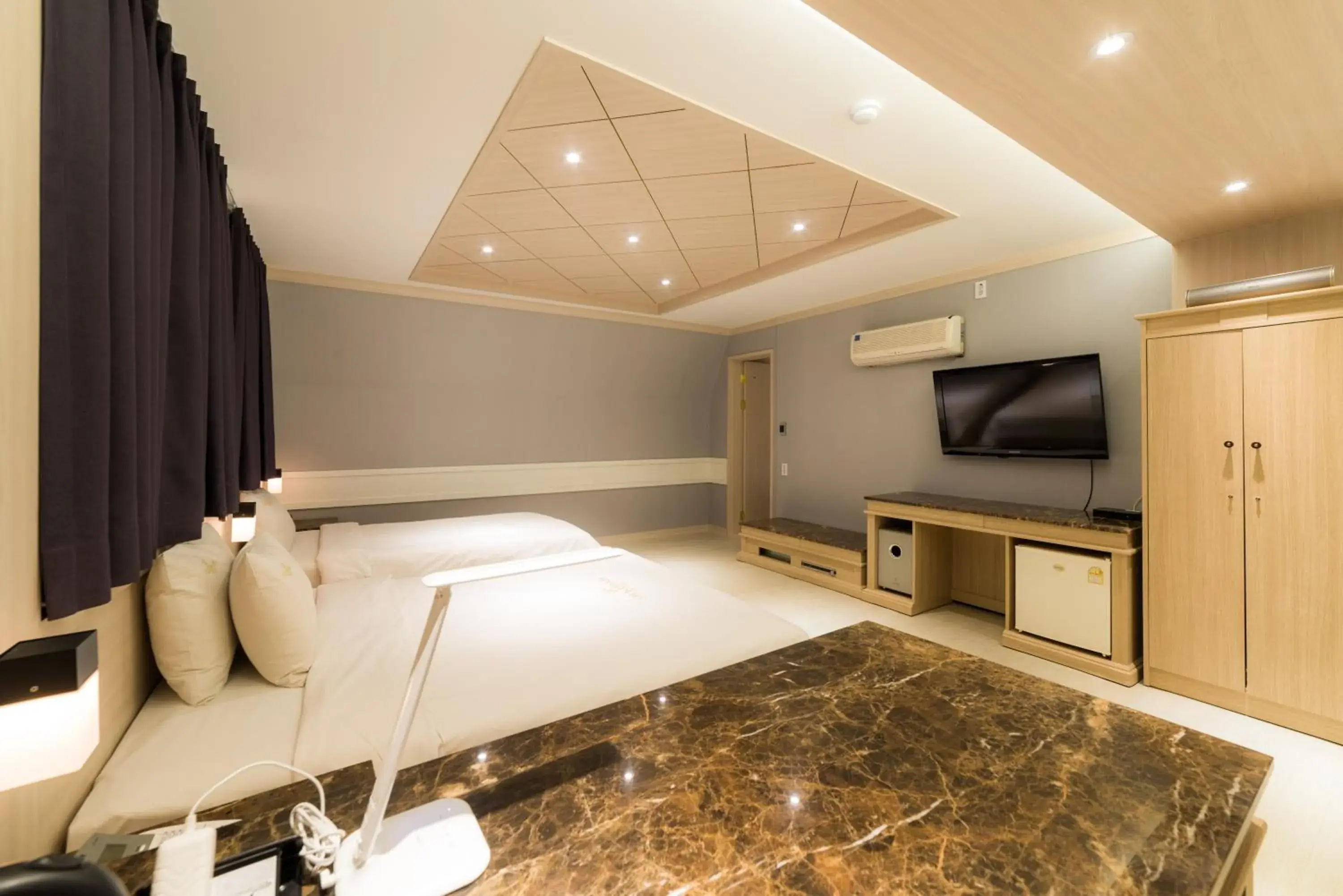 Bed in Reborn Suwon Silkroad Hotel Bed in Reborn Suwon Silkroad Hotel