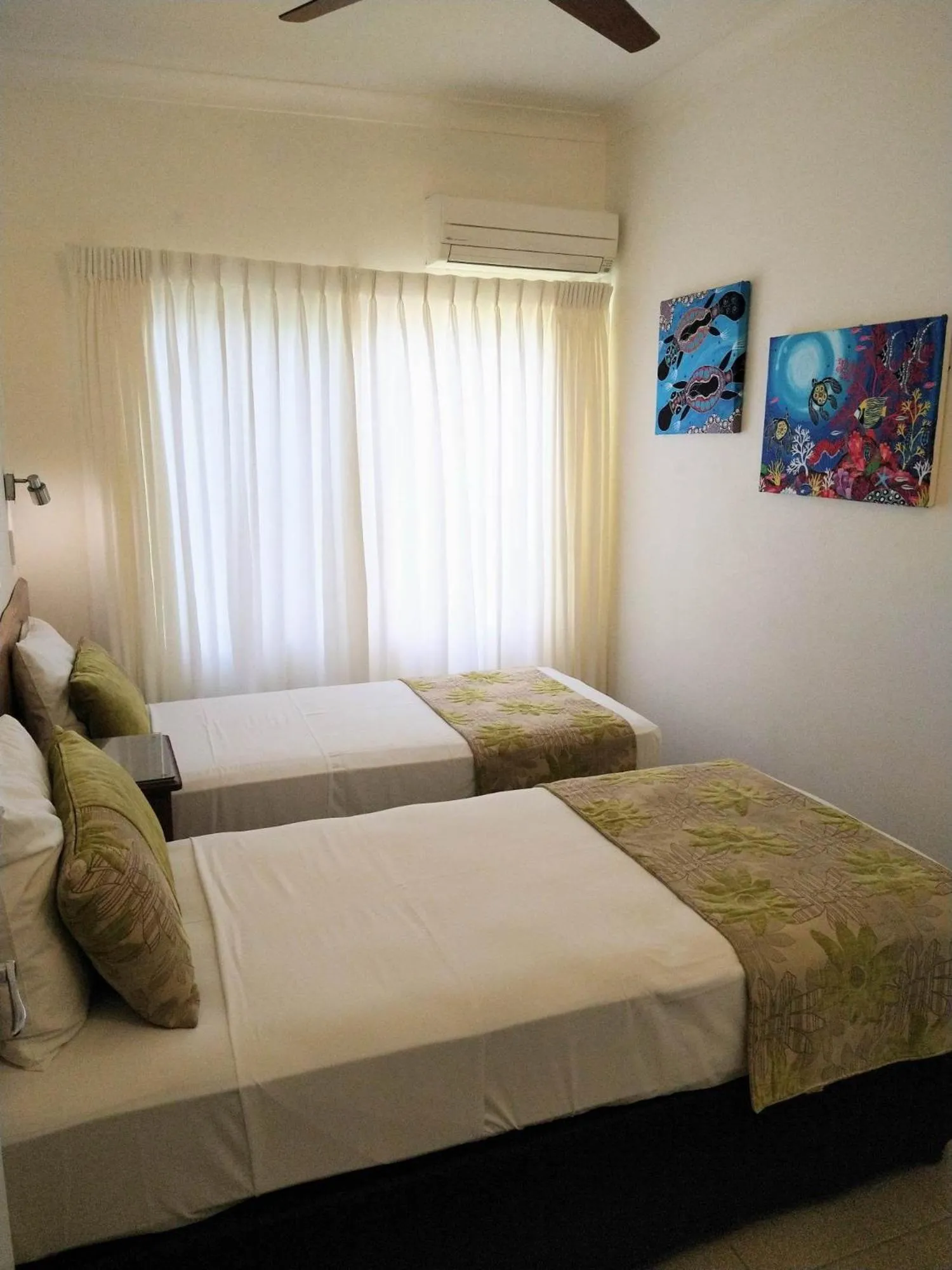 Bed in Villa Marine Holiday Apartments Cairns
