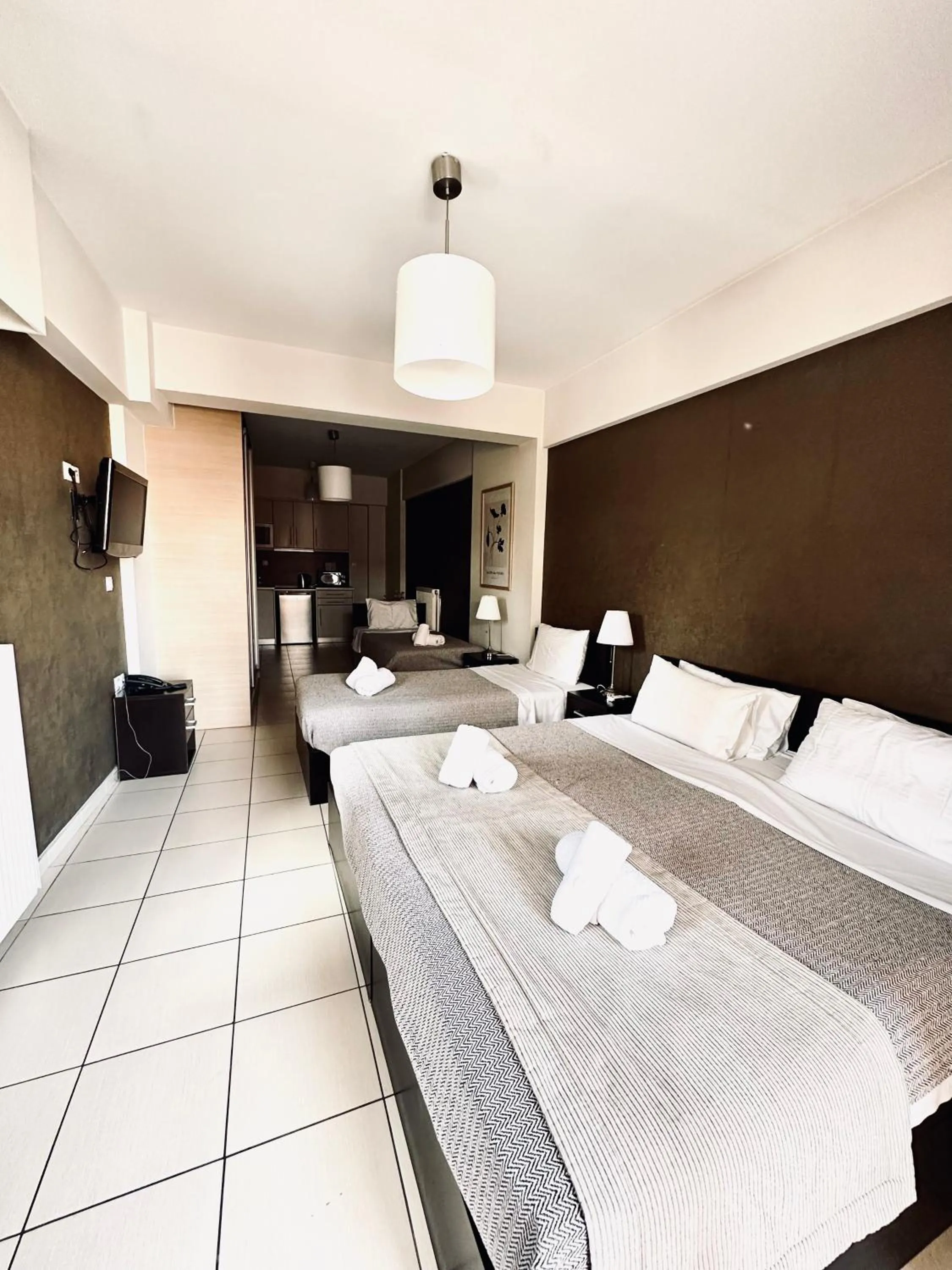 Bed in Mc Queen Rooms & Apartments