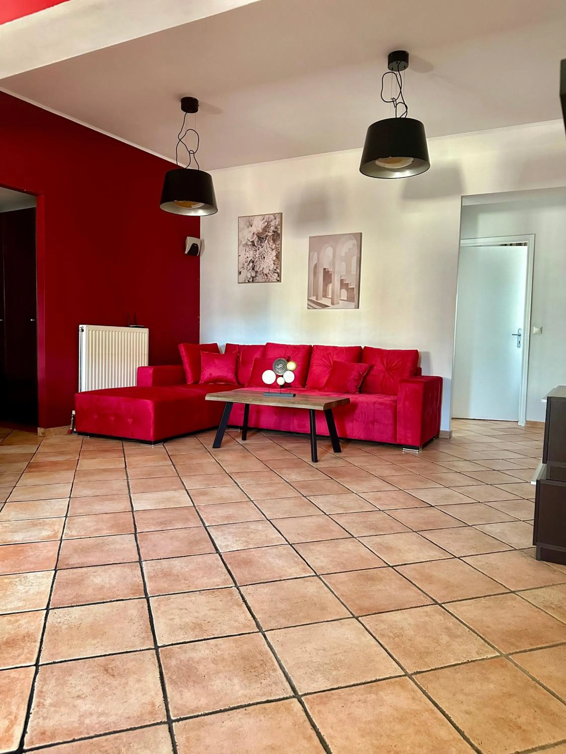 Living room in Mc Queen Rooms & Apartments