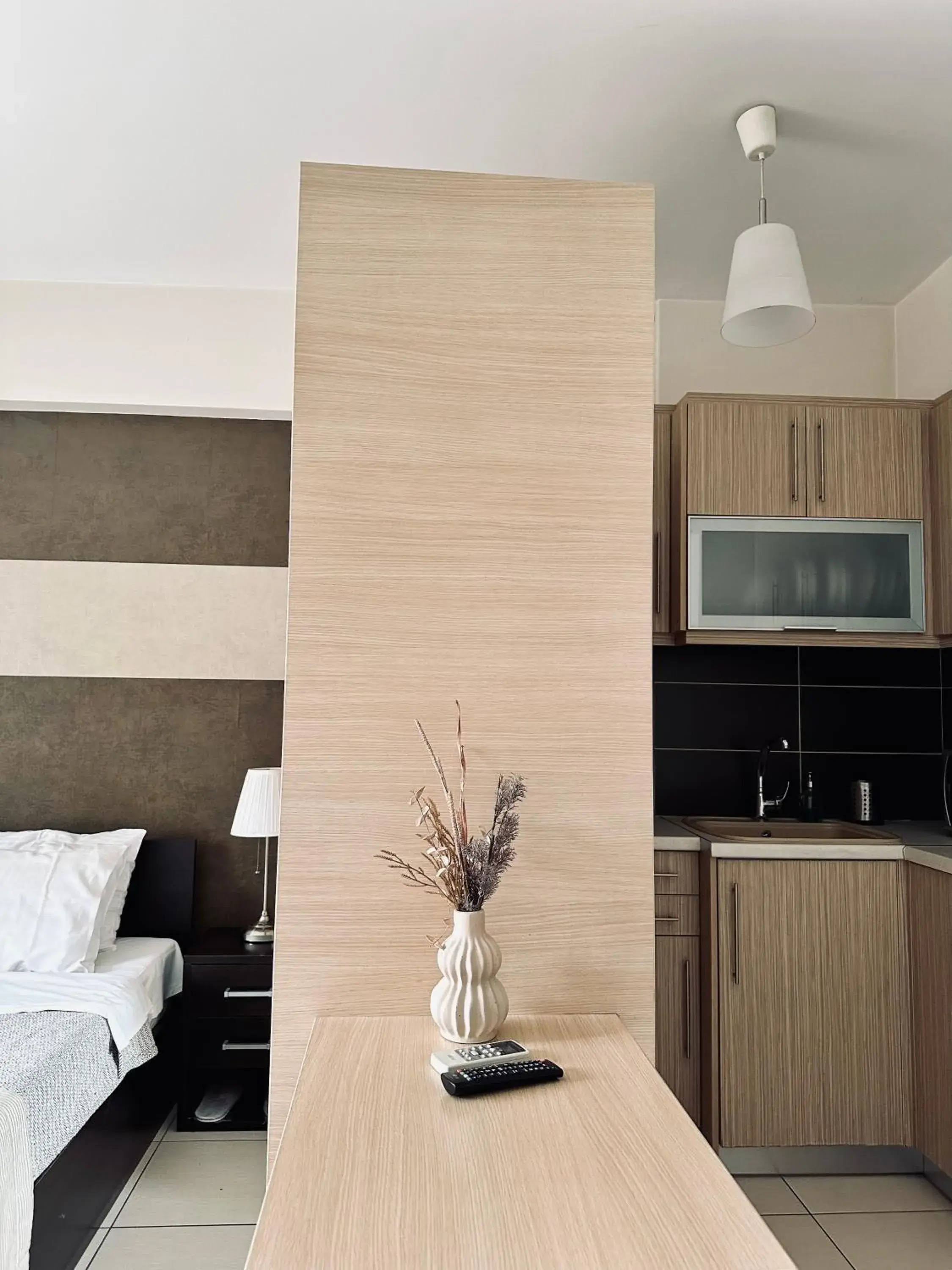 Bed in Mc Queen Rooms & Apartments Bed in Mc Queen Rooms & Apartments