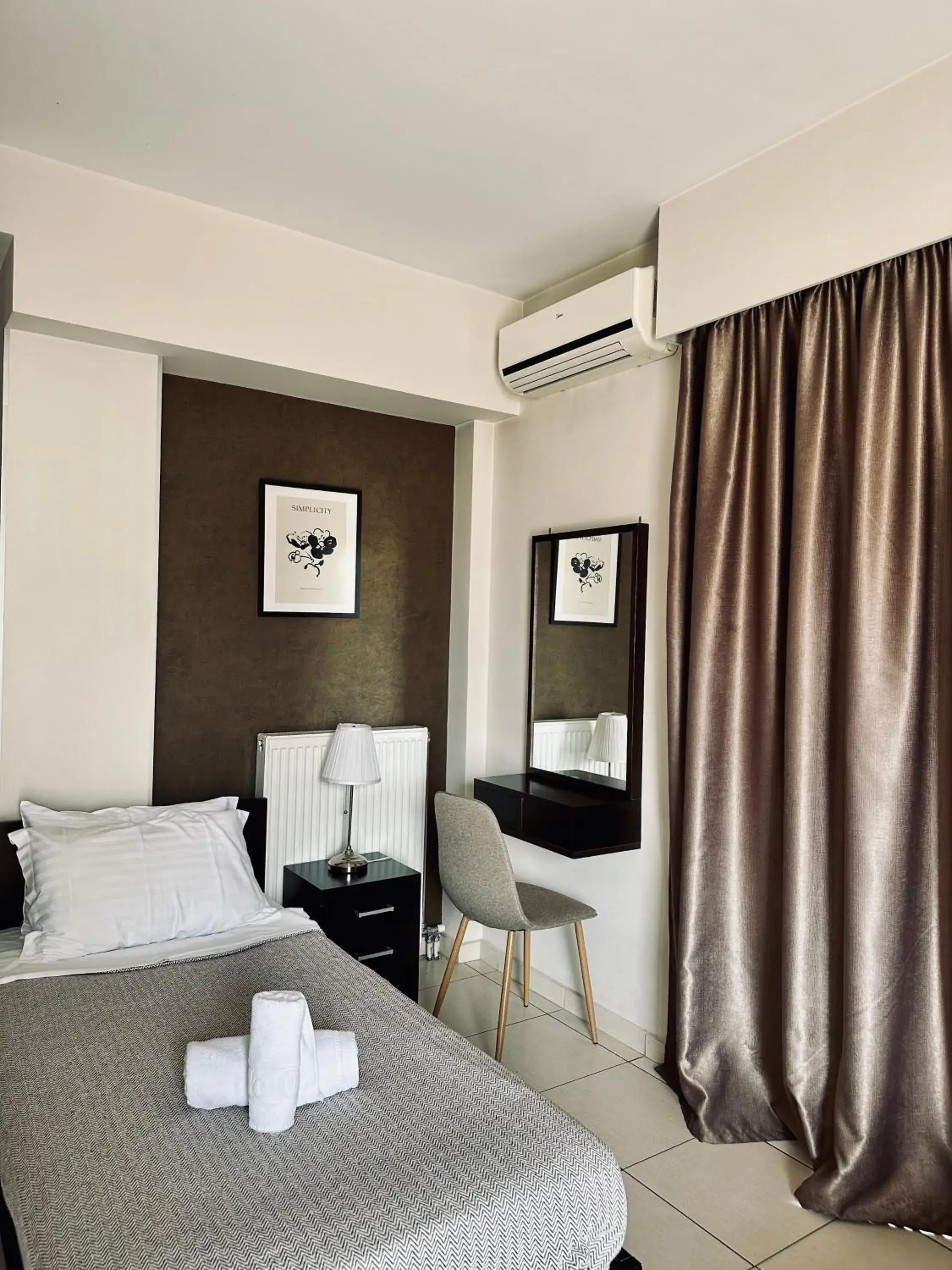 Bed in Mc Queen Rooms & Apartments Bed in Mc Queen Rooms & Apartments