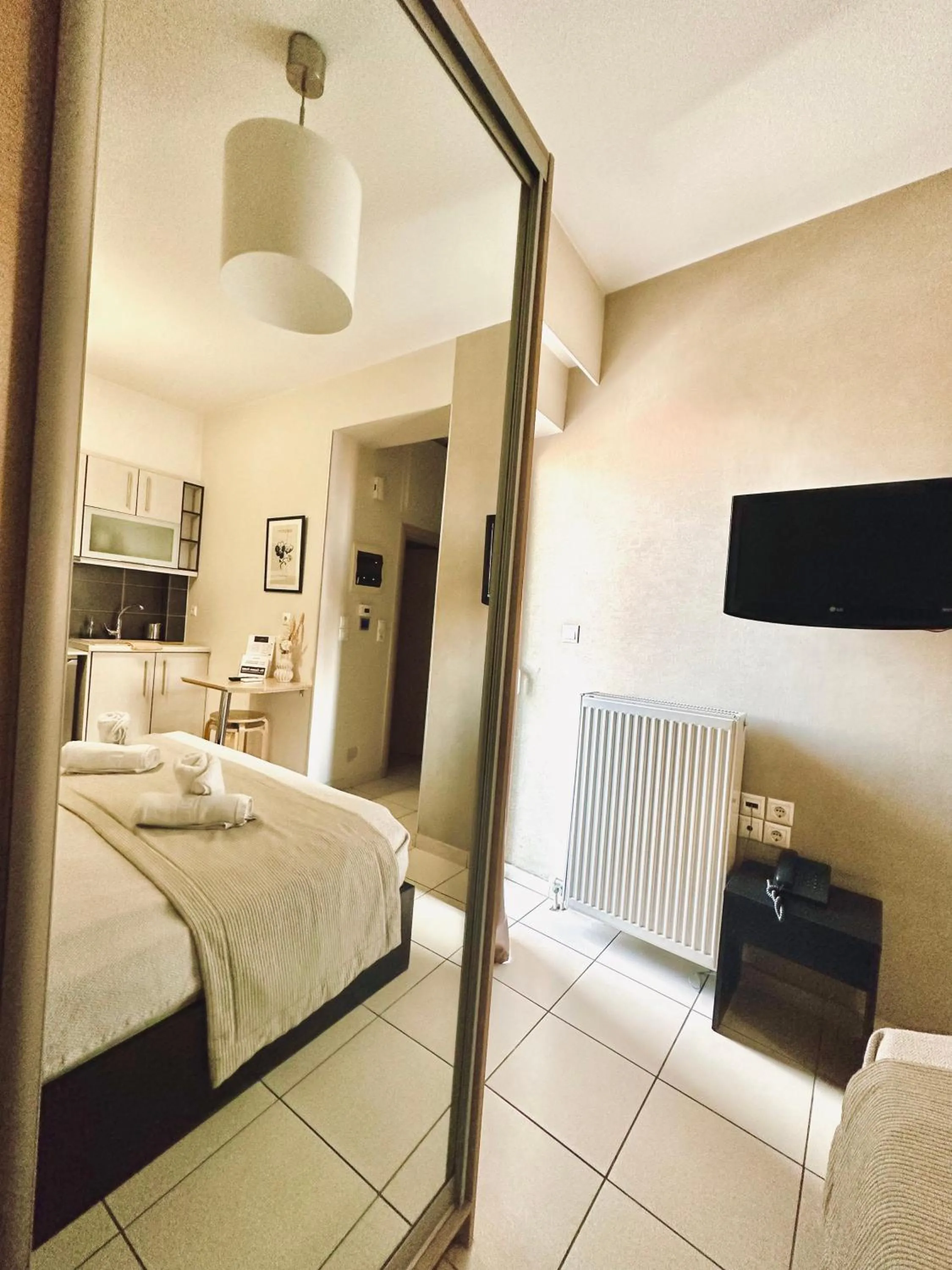 Bed in Mc Queen Rooms & Apartments