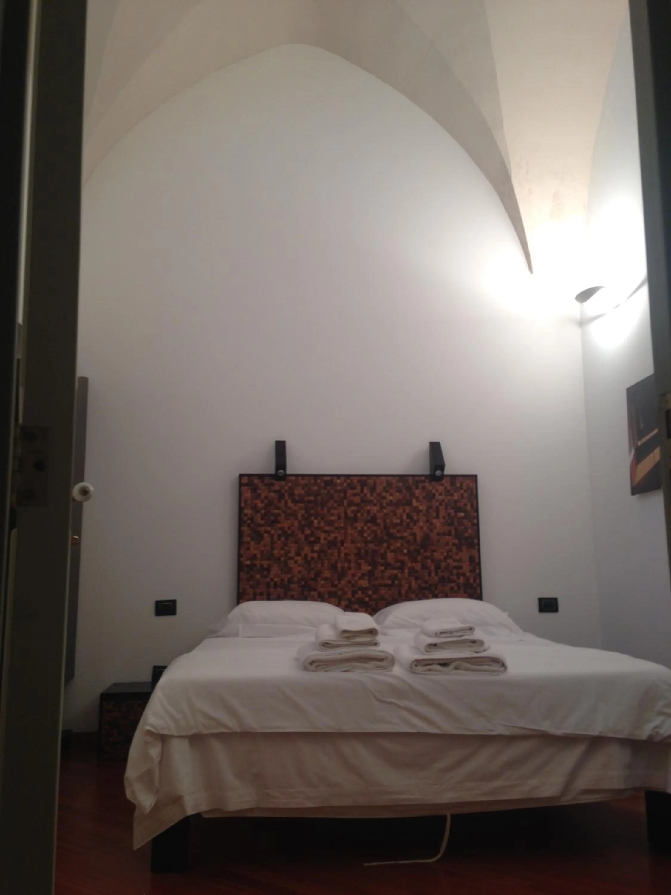 Bed in Alvino Suite And Breakfast