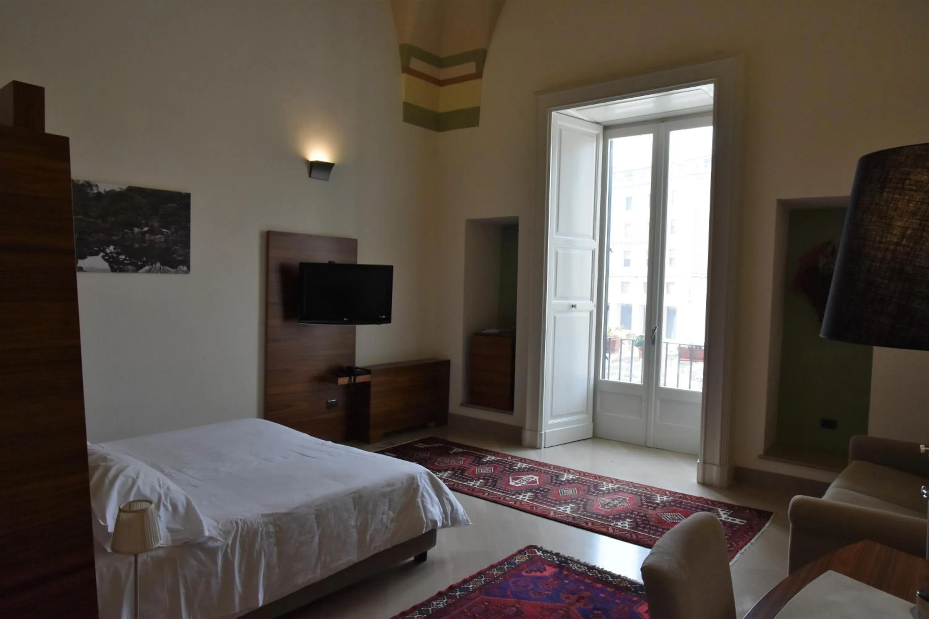 Bed in Alvino Suite And Breakfast