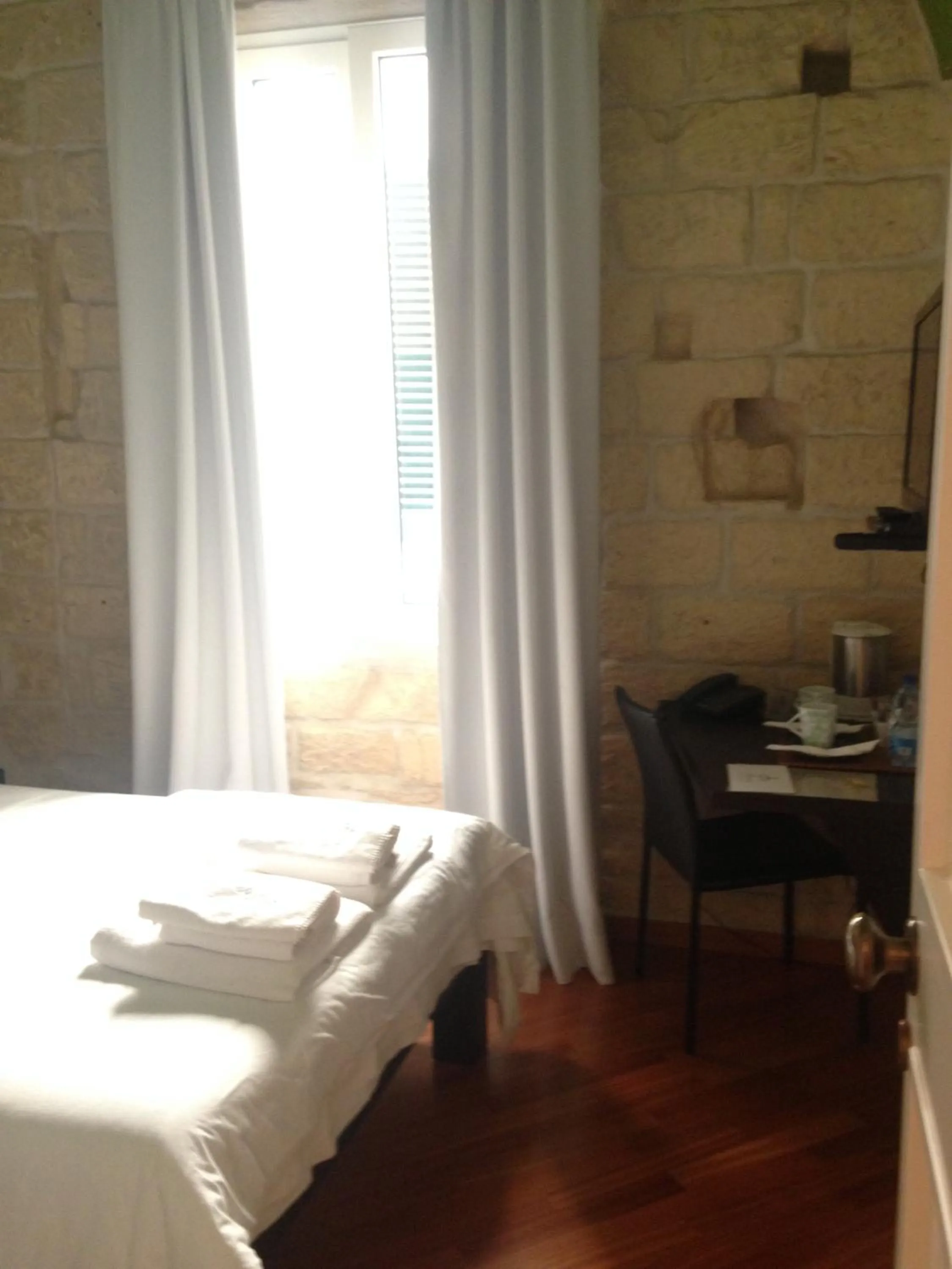 Bed in Alvino Suite And Breakfast